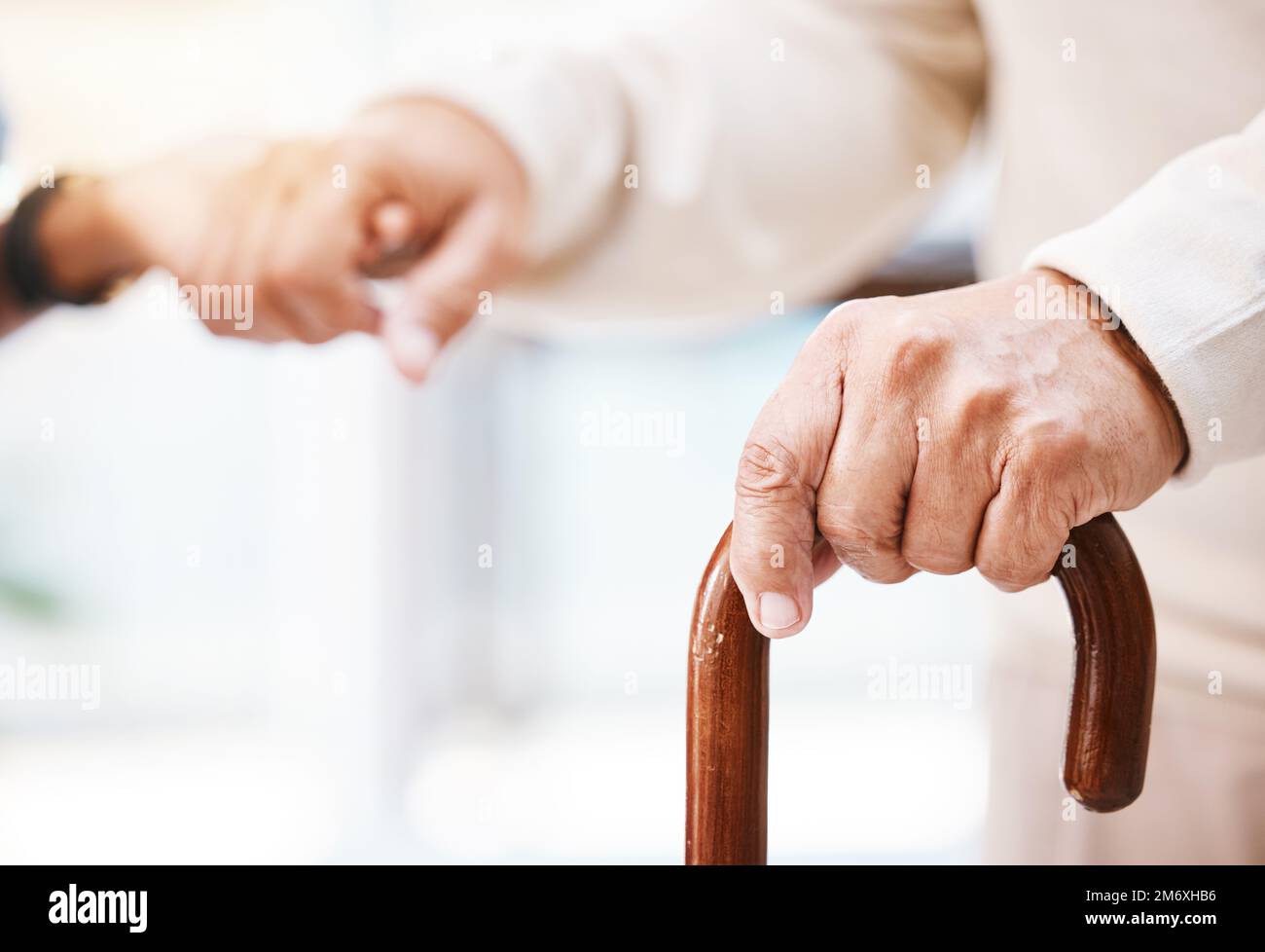 Walking stick, senior patient and nurse hands for help, support and