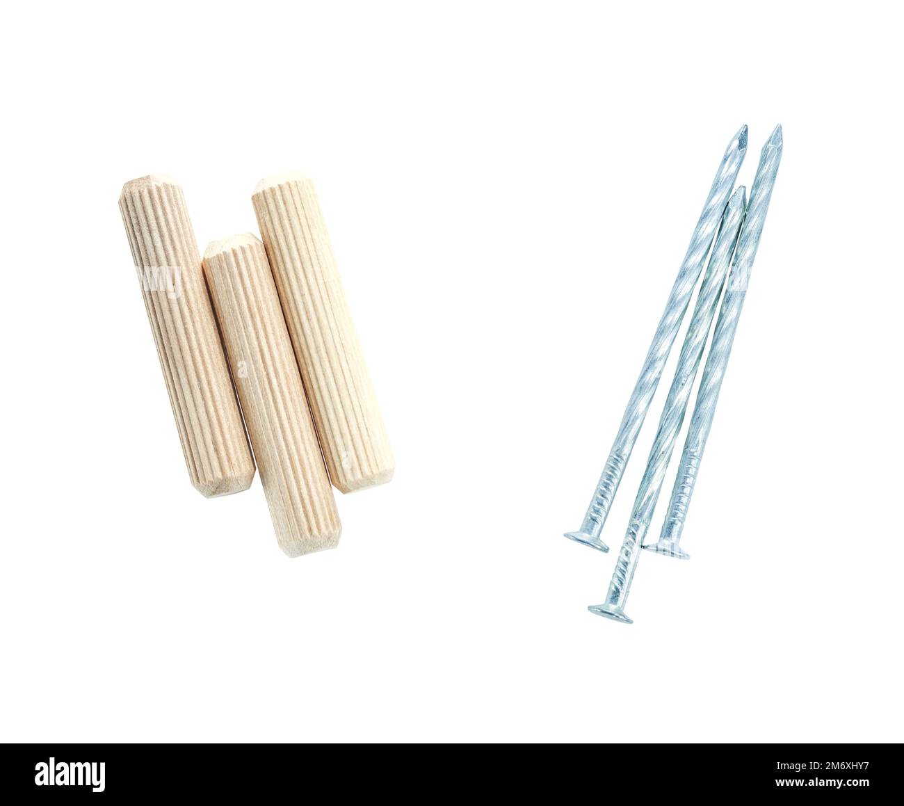 Construction nails wooden dowels isolated on white Stock Photo Alamy