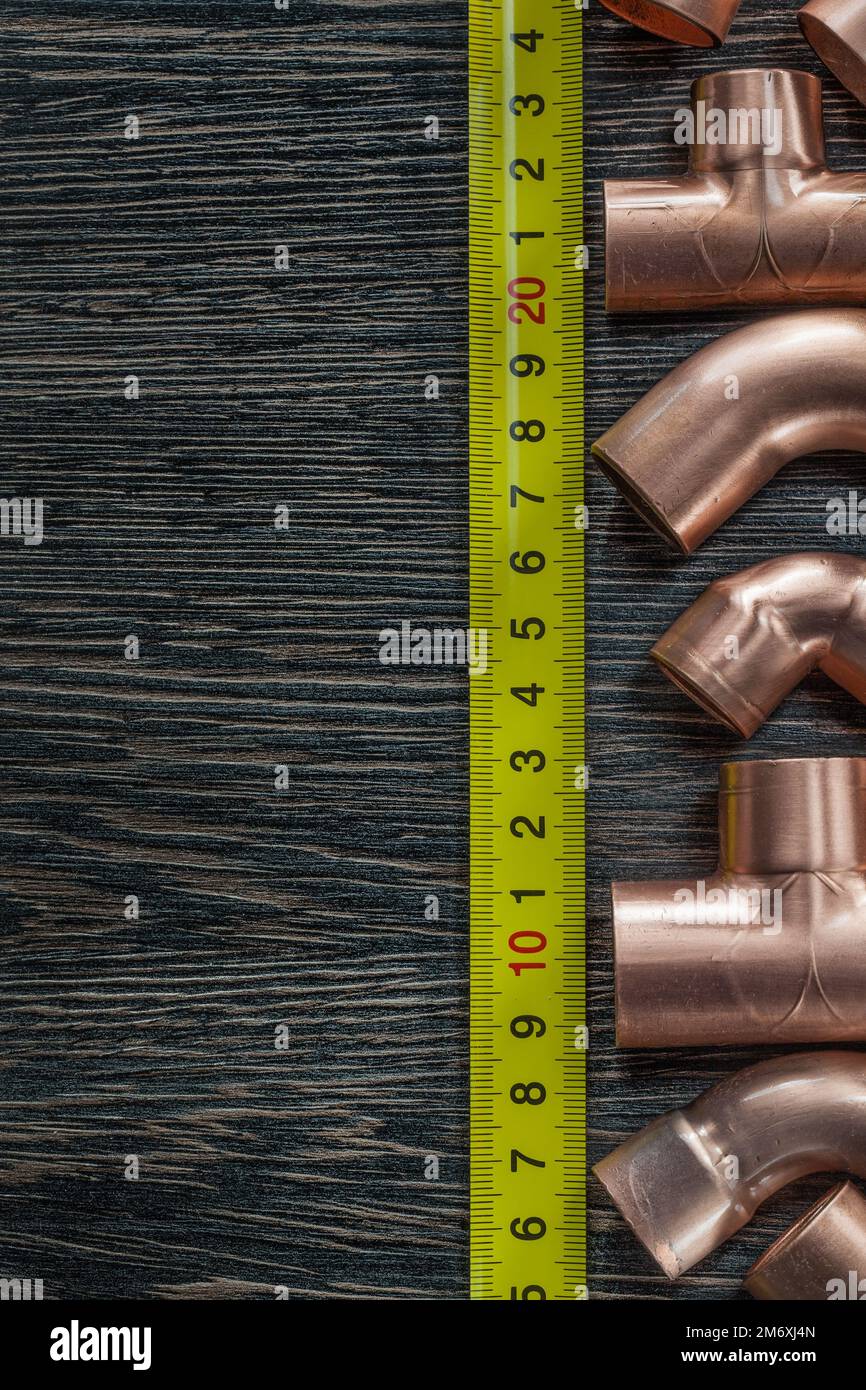 Copper water pipes measuring tape Stock Photo Alamy