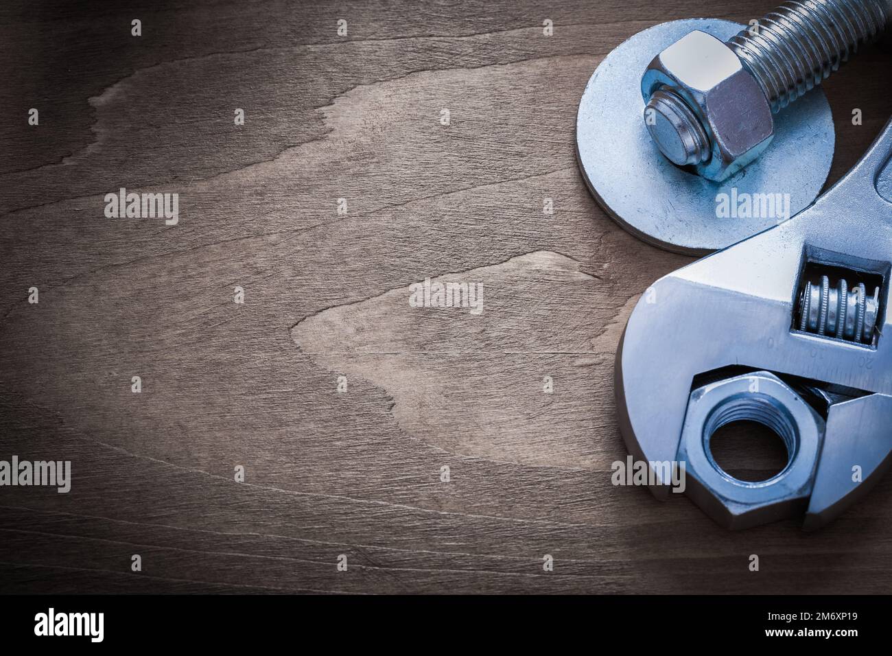 Metal adjustable spanner bolt washers construction nuts and screwbolts Stock Photo Alamy