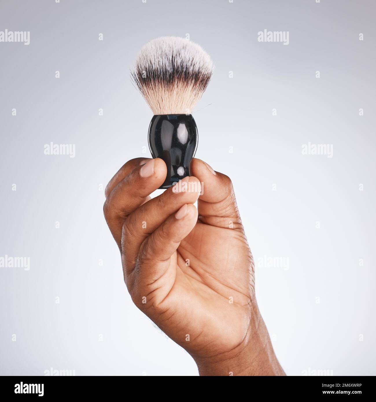 Hand, brush and shaving with beauty and black man, hygiene and grooming with skincare mockup. Shave, body hair care and cosmetic tools marketing with Stock Photo