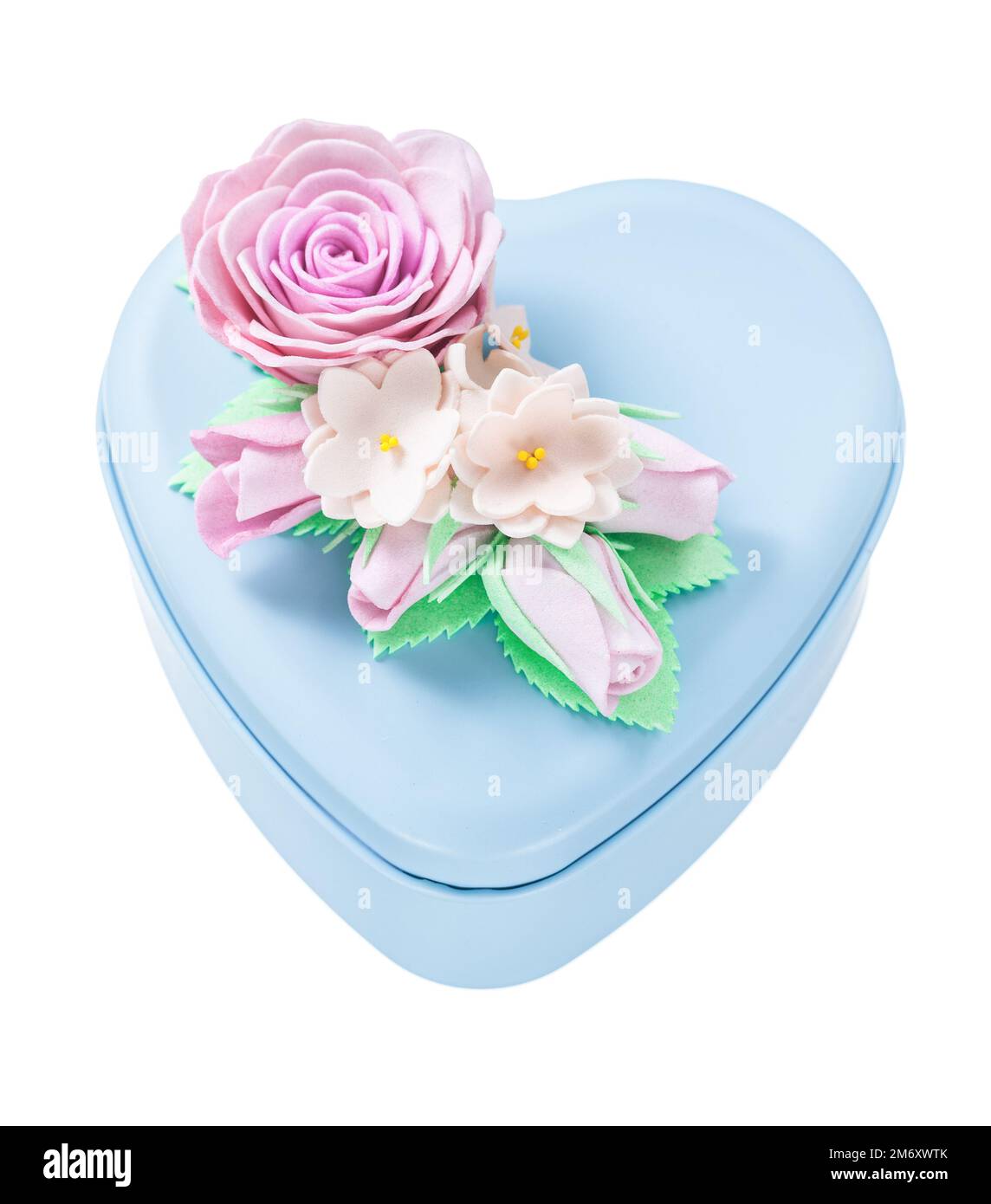 Heart-shaped blue gift box isolated on white. Stock Photo