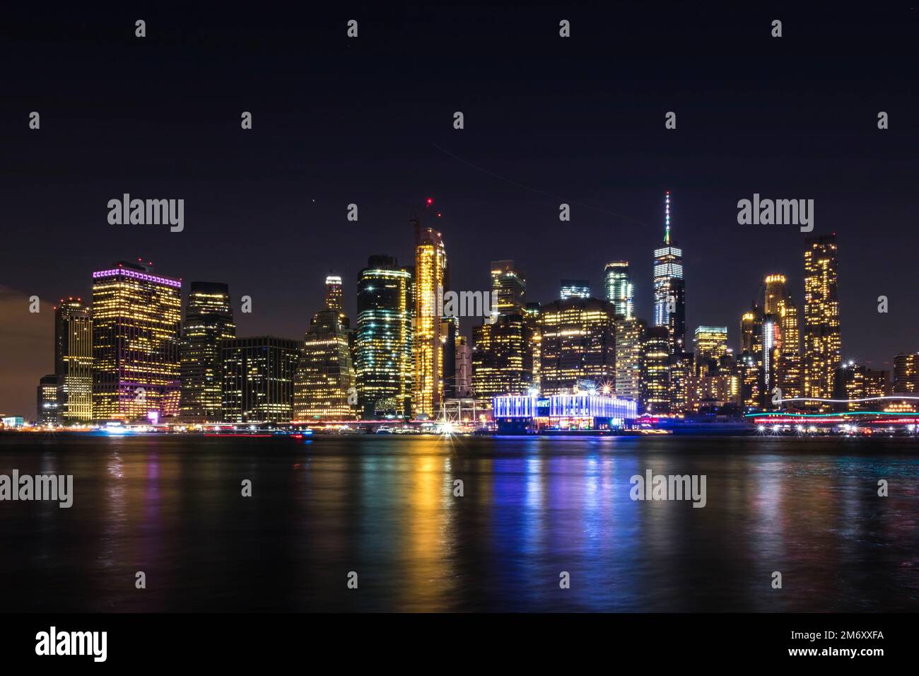 A beautiful shot of the illuminated skyline of New York at night in the ...