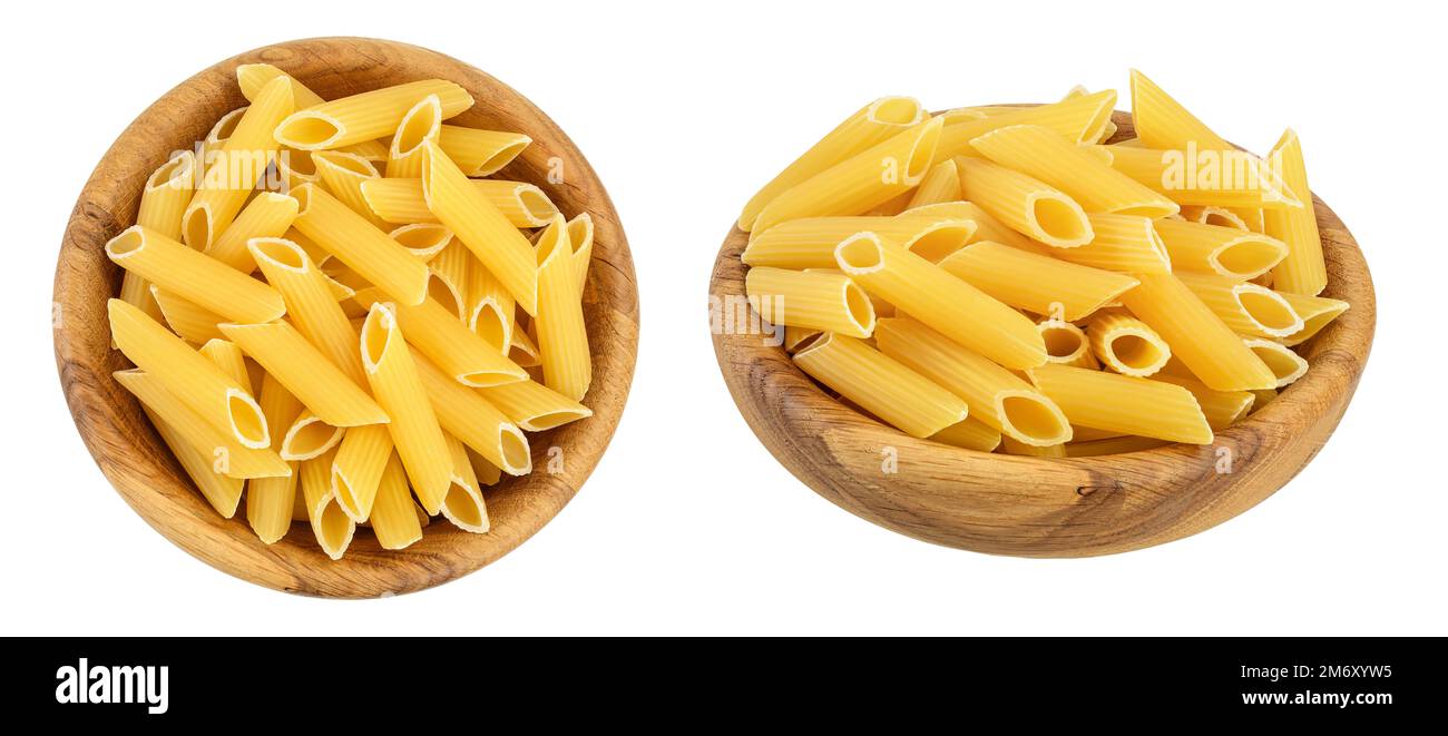 Raw italian penne rigate pasta in wooden bowl isolated on white background with full depth of field. Top view. Flat lay Stock Photo