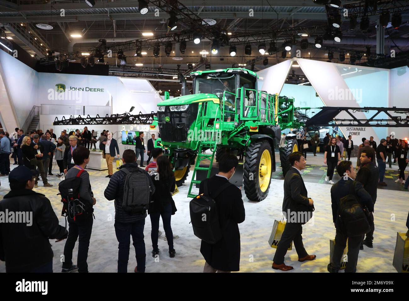 Las Vegas, United States. 05th Jan, 2023. Attendees are seen viewing a John Deere 412R self-propelled sprayer with a factory-installed See & Spray Ultimate system, on display during the 2023 International CES, at the Las Vegas Convention Center in Las Vegas, Nevada on Thursday, January 5, 2023. The See & Spray system is a targeted spray technology consisting of 36 cameras on a 120-foot boom. Photo by James Atoa/UPI Credit: UPI/Alamy Live News Stock Photo
