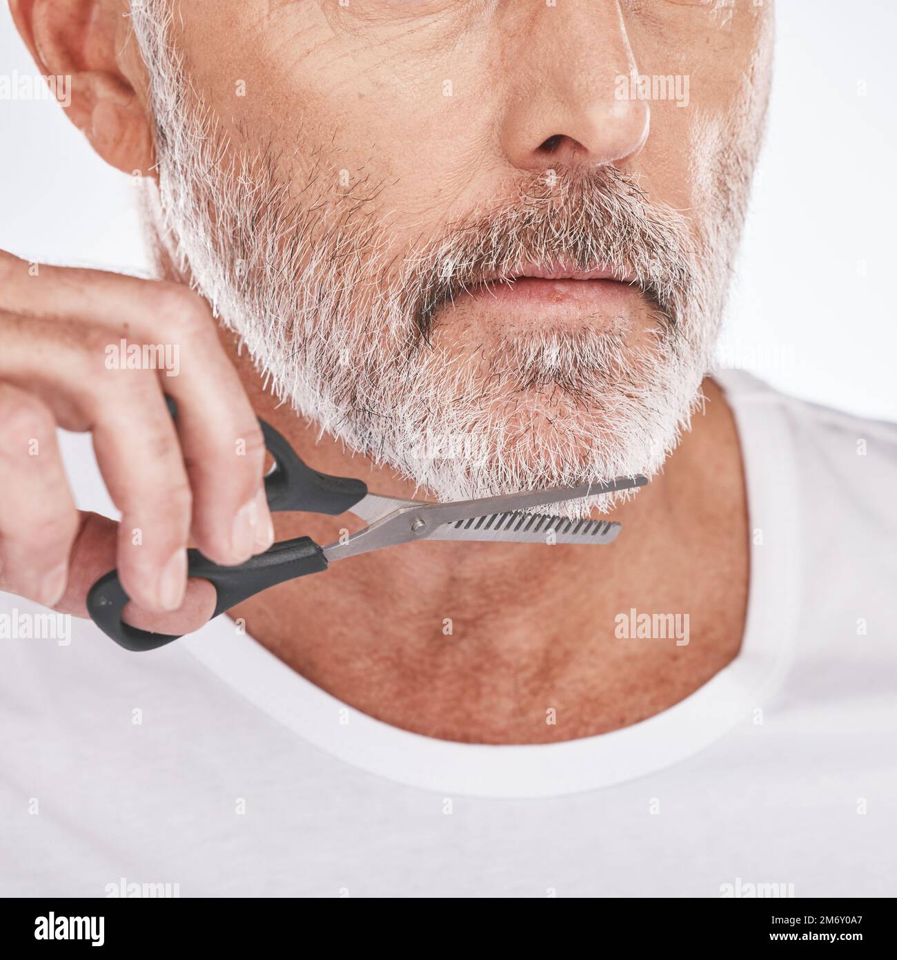 Trim, beard and senior man with scissors for grooming, facial cleaning