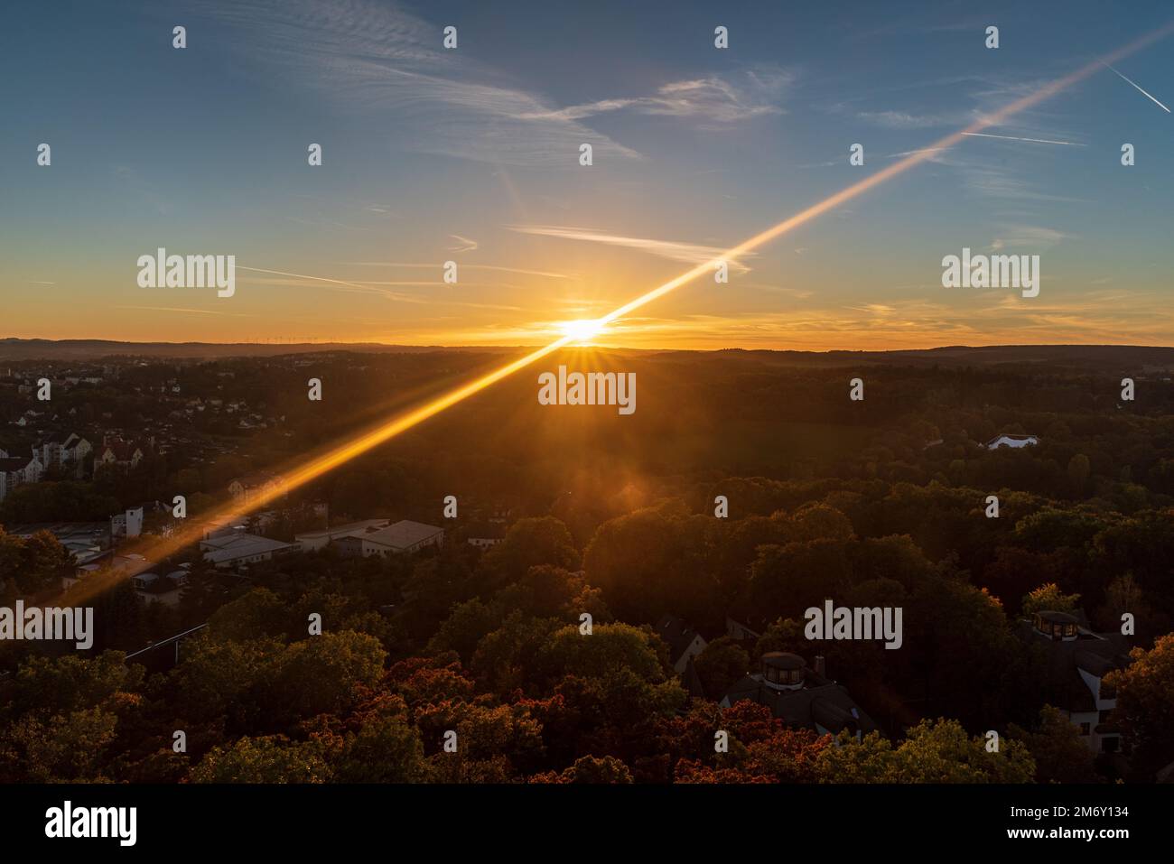 Autumn sunset with sunlight from Bareinstein above Plauen city in Germany Stock Photo