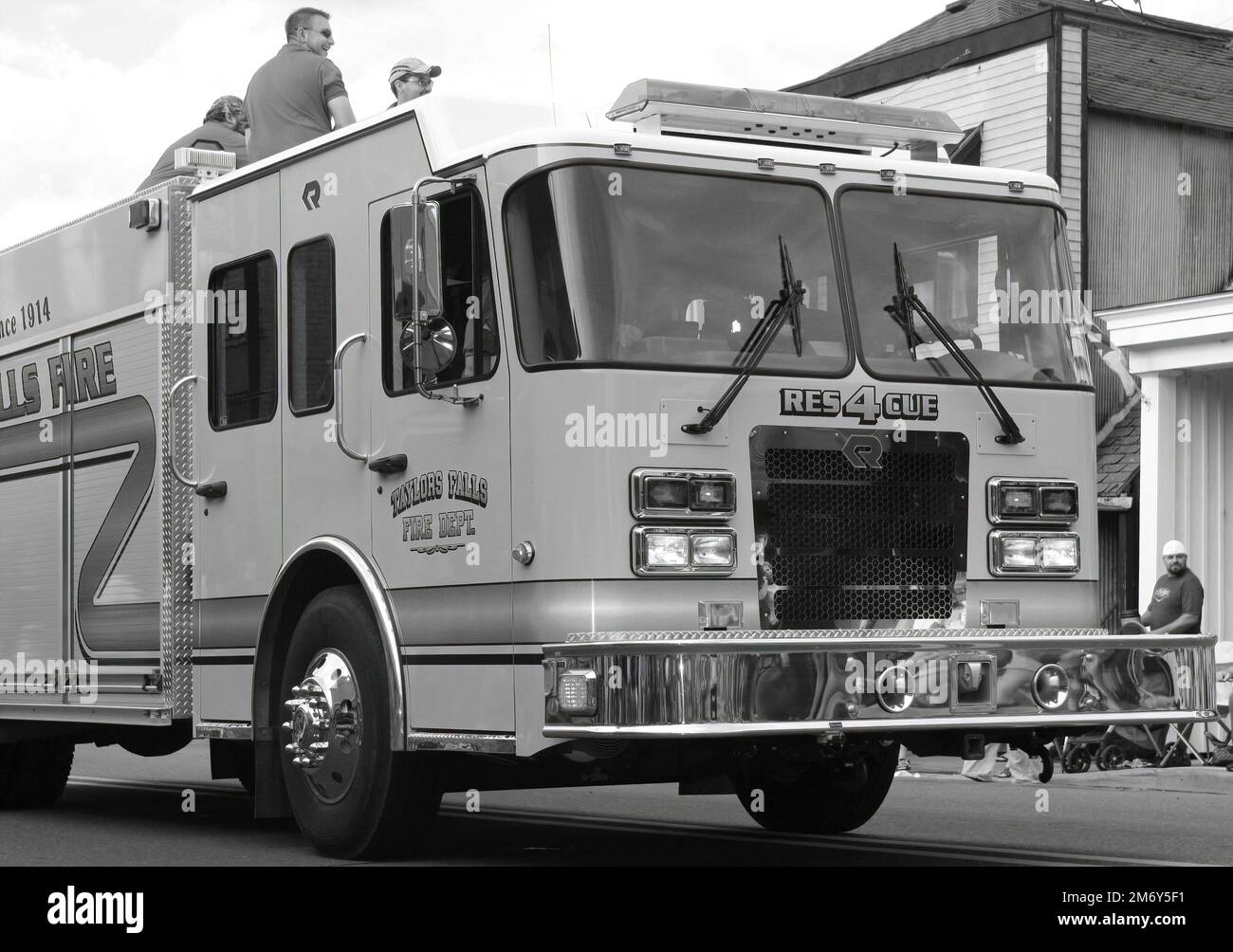 Taylors Falls Fire Department rescue truck with firefighters in the