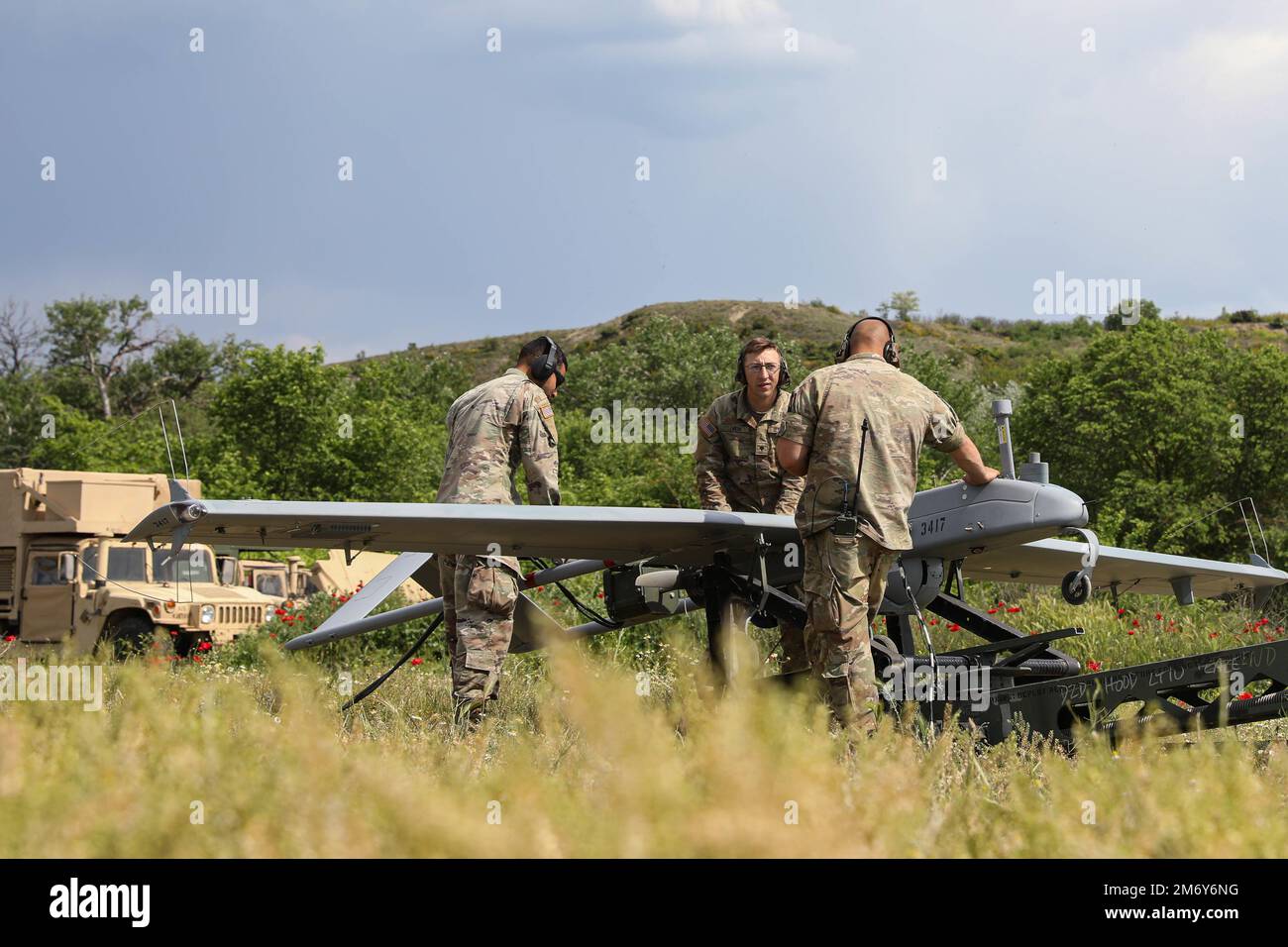 Soldiers assigned to the 7-17th Air Cavalry Squadron, 1st Air Cavalry Brigade perform routine maintenance on a RQ-7B V2 Shadow during Exercise Swift Response on May 10, 2022 at Krivolak Training Area, North Macedonia.The purpose of this exercise is to present combat credible Army forces in Europe and Africa, and enhance readiness by building airborne interoperability with Allies and Partners and the integration of joint service partnership. Stock Photo