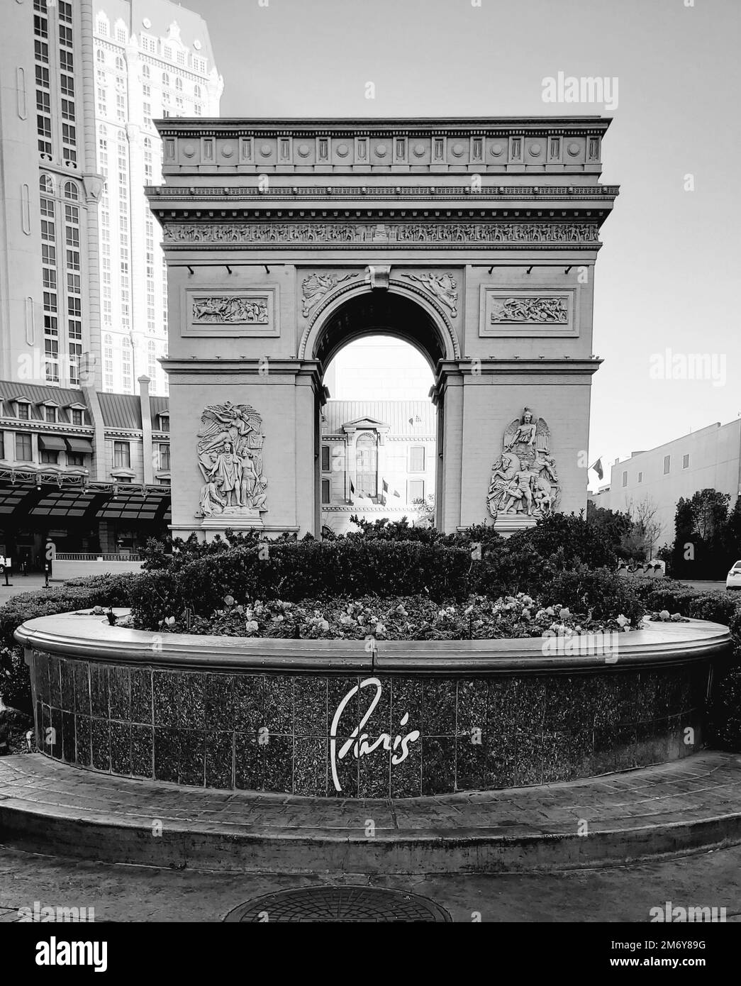 A grayscale shot of a half-size version of Arc de Triomphe in Las Vegas. Stock Photo