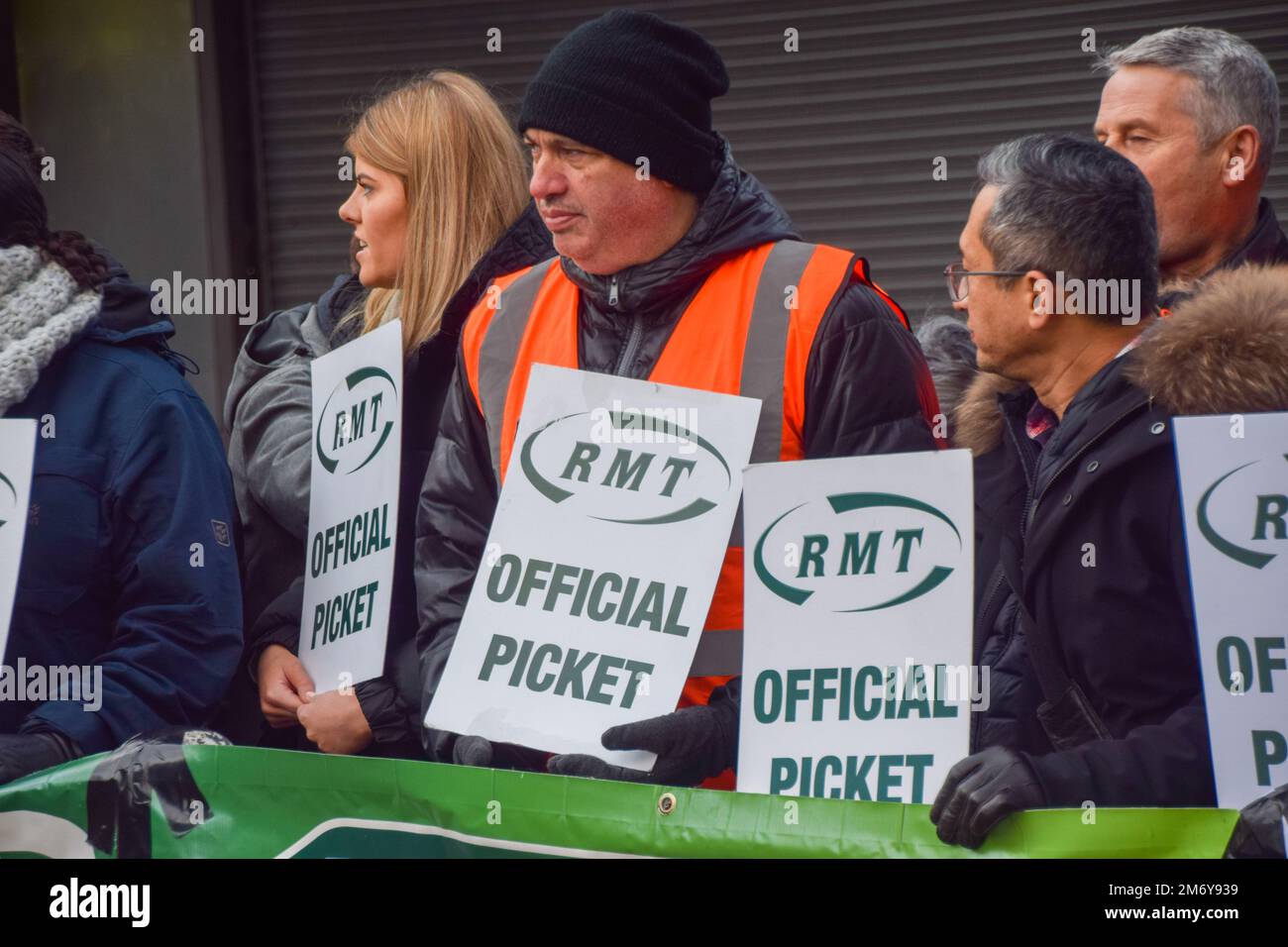 London, England, UK. 6th Jan, 2023. Rail workers stand at the RMT (Rail ...