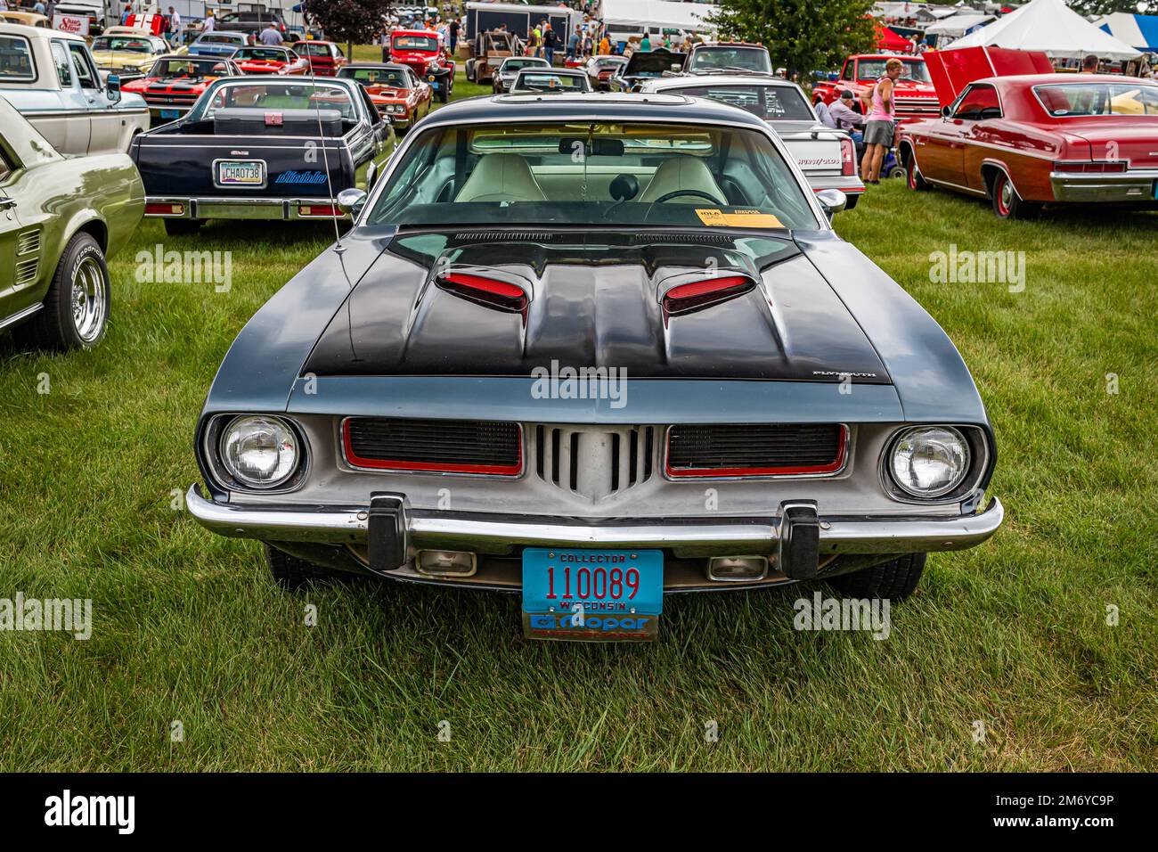 Iola, WI - July 07, 2022: High perspective front view of a 1973 Plymouth Barracuda 2 Door Hardtop at a local car show. Stock Photo