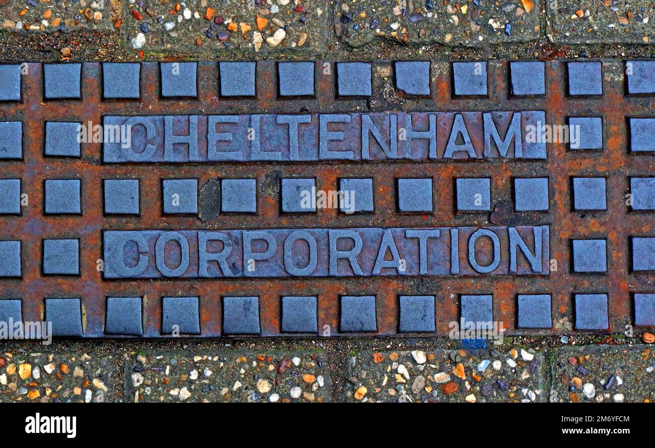 Cast iron embossed rusting Cheltenham Corporation grid, Cheltenham town centre, Gloucestershire, England, UK, GL50 Stock Photo