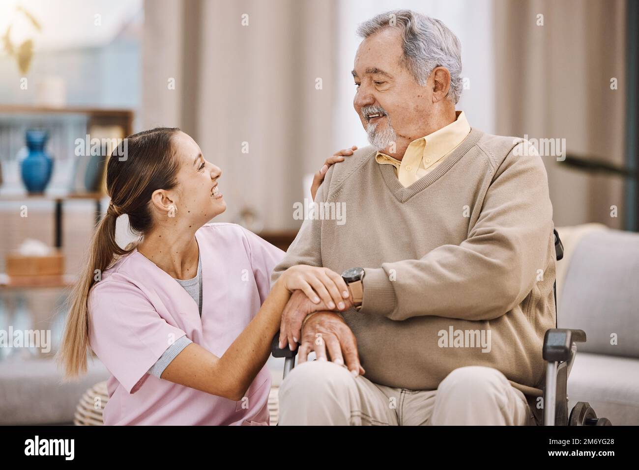 Healthcare, disability and man in wheelchair with nurse in retirement