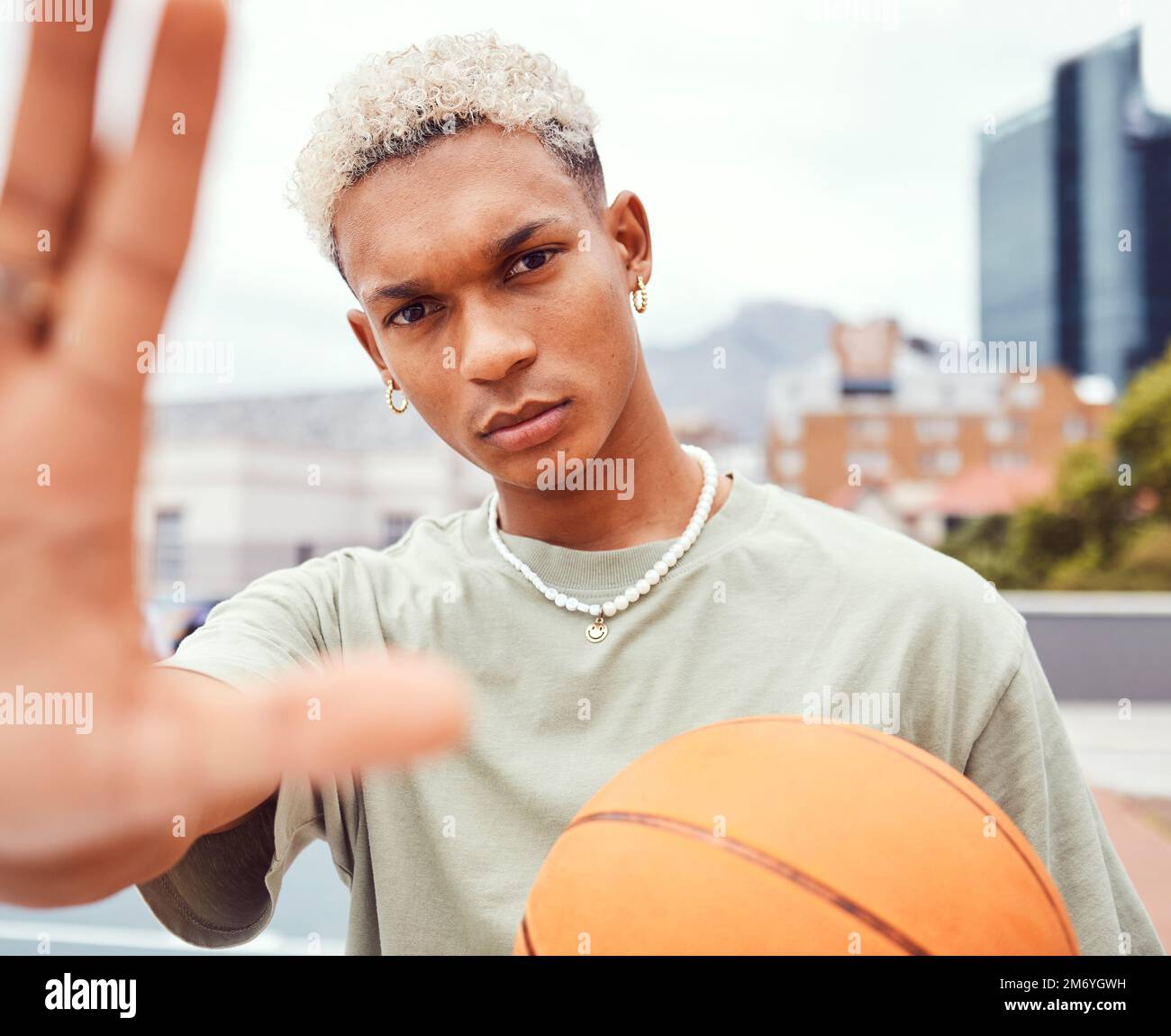 Sports, selfie and basketball player with fashion with a ball standing on an outdoor court