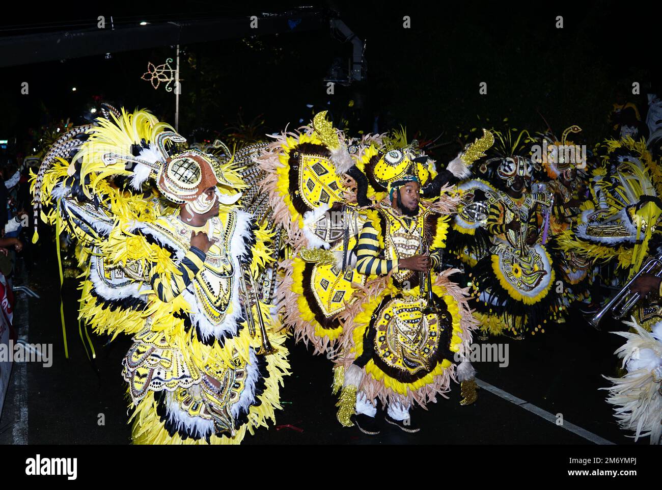 The people in traditional costumes during a Junkanoo parade in the Bahamas. Stock Photo
