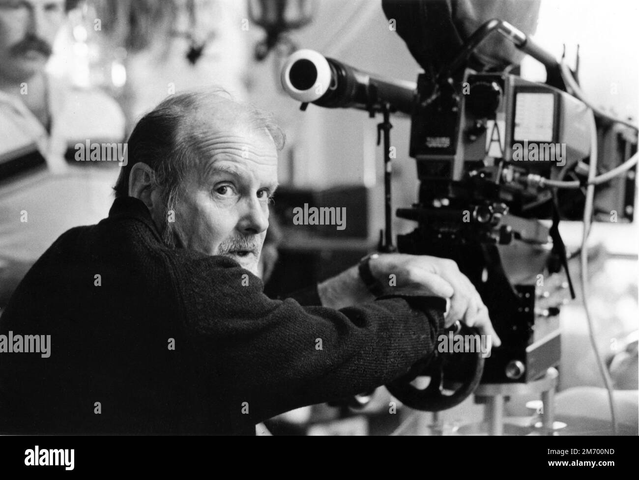 Director BOB FOSSE on set candid portrait next to Movie Camera during filming of STAR 80 (1983) director / writer BOB FOSSE from article Death of a Playmate by Teresa Carpenter cinematographer Sven Nykvist The Ladd Company / Warner Bros. Stock Photo