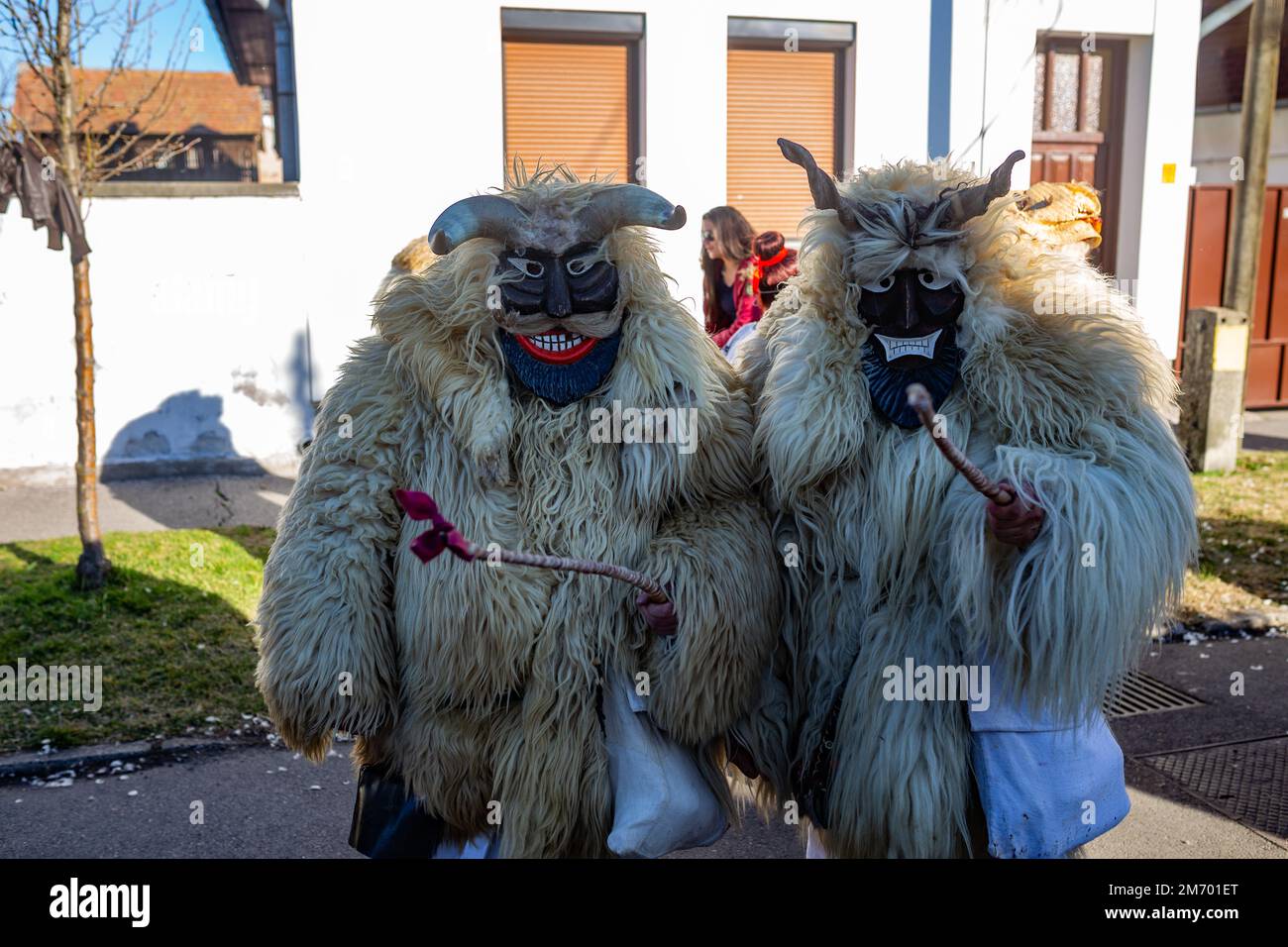 Two busos in the street during the annual Buso festivities / Poklade from Mohacs, Hungary Stock Photo