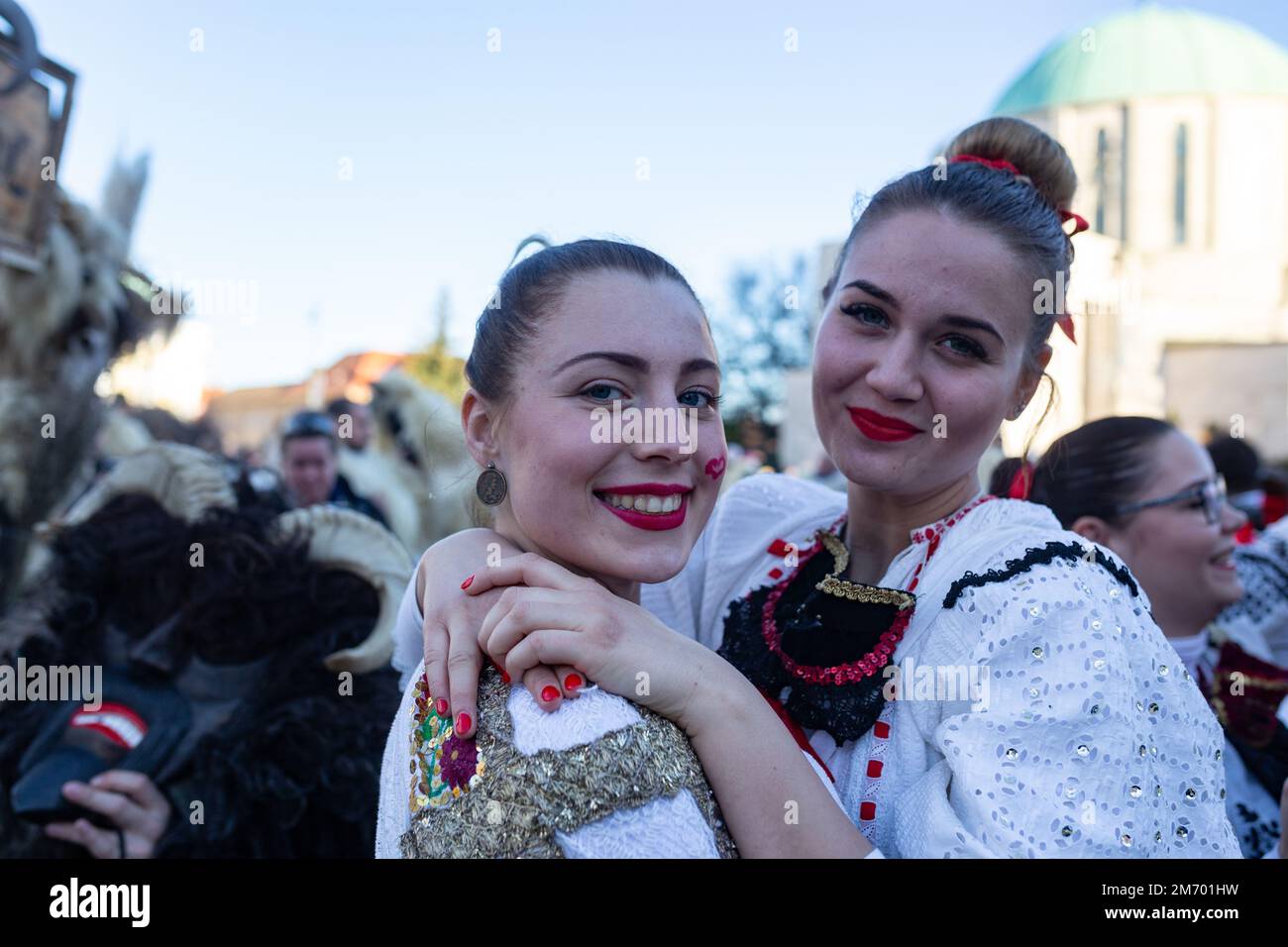 Young women in traditional clothes during the annual Buso festivities / Poklade from Mohacs, Hungary Stock Photo