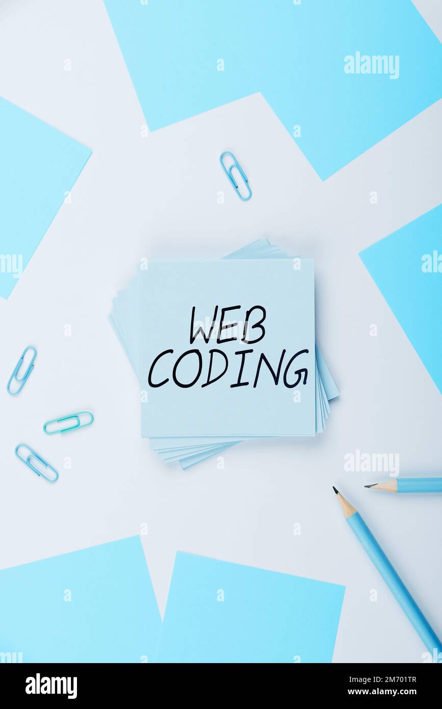 Writing displaying text Web Coding. Internet Concept work involved in developing a web site for the Internet Stock Photo