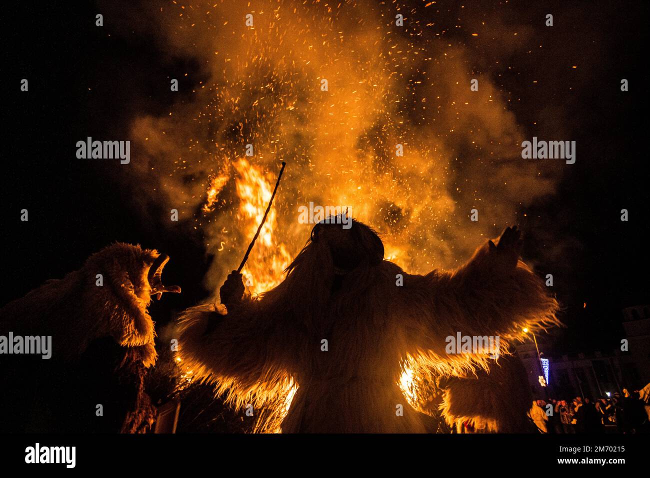 Buso by the fire during Poklade (annual Buso festivities) in Mohacs, Hungary Stock Photo