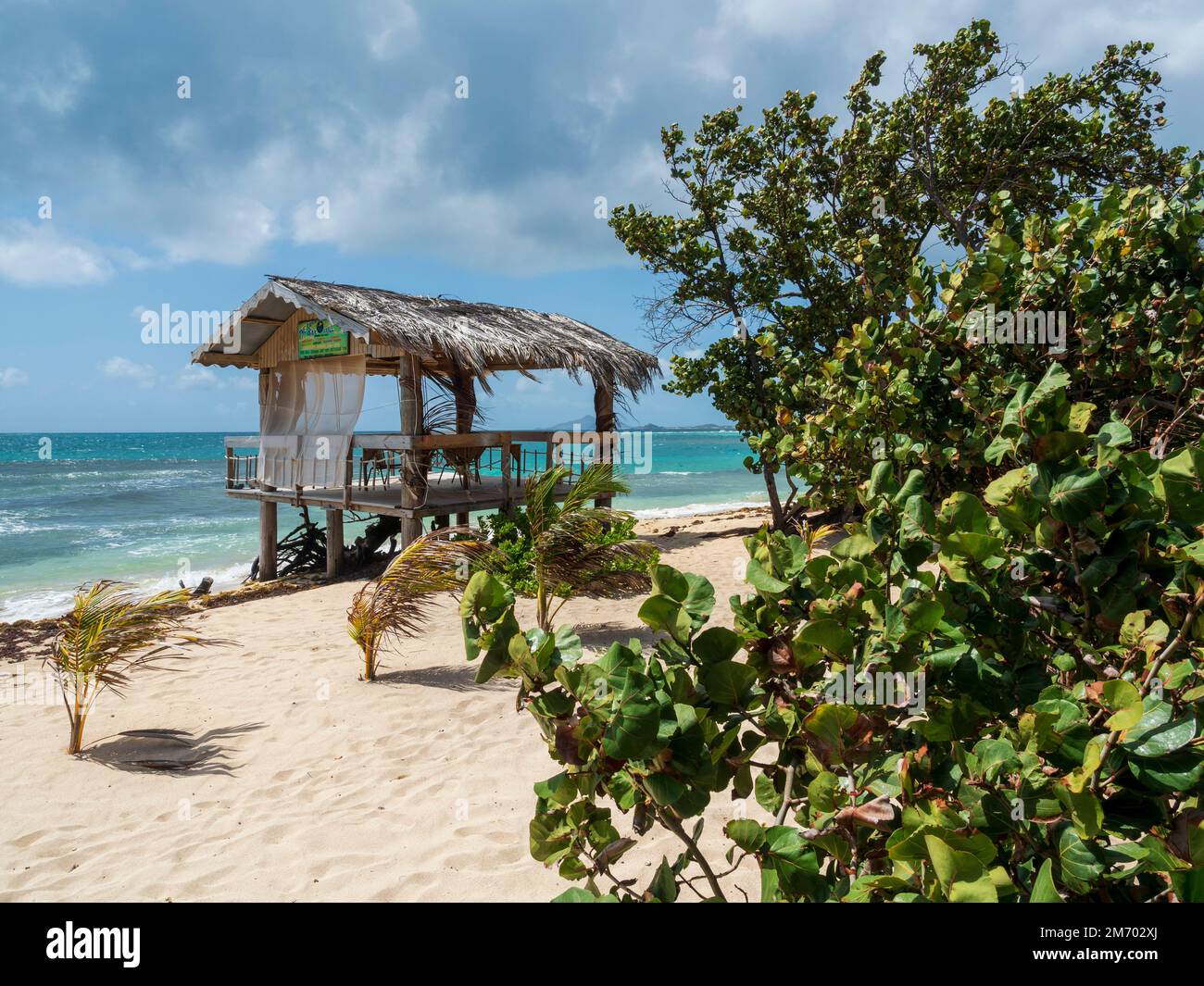 Mayreau, Grenadines, Caribbean island. Windward Bay. Ranch Escapade beach bar. Stock Photo