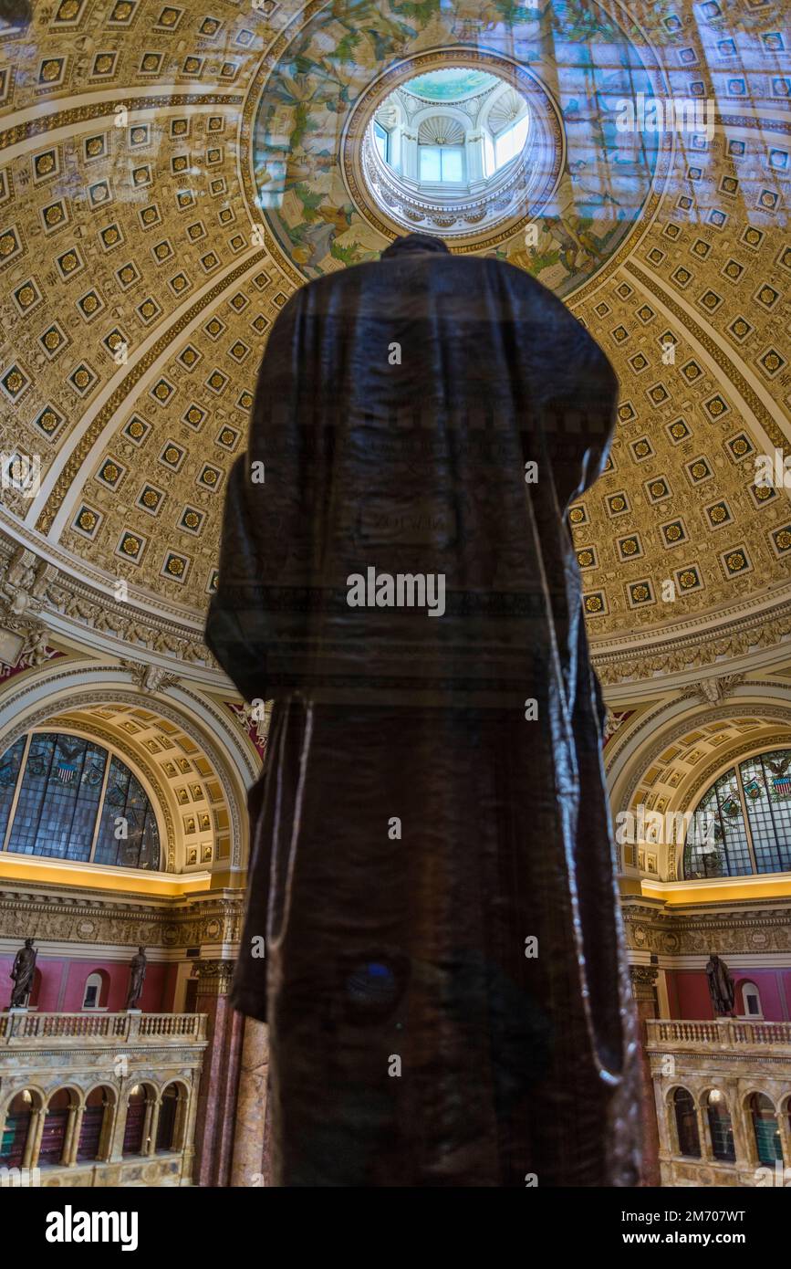 Statue above Main reading room in The Library of Congress is the world