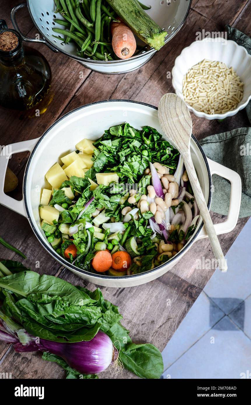 Minestrone Genovese (vegetable soup with basil pesto) Stock Photo