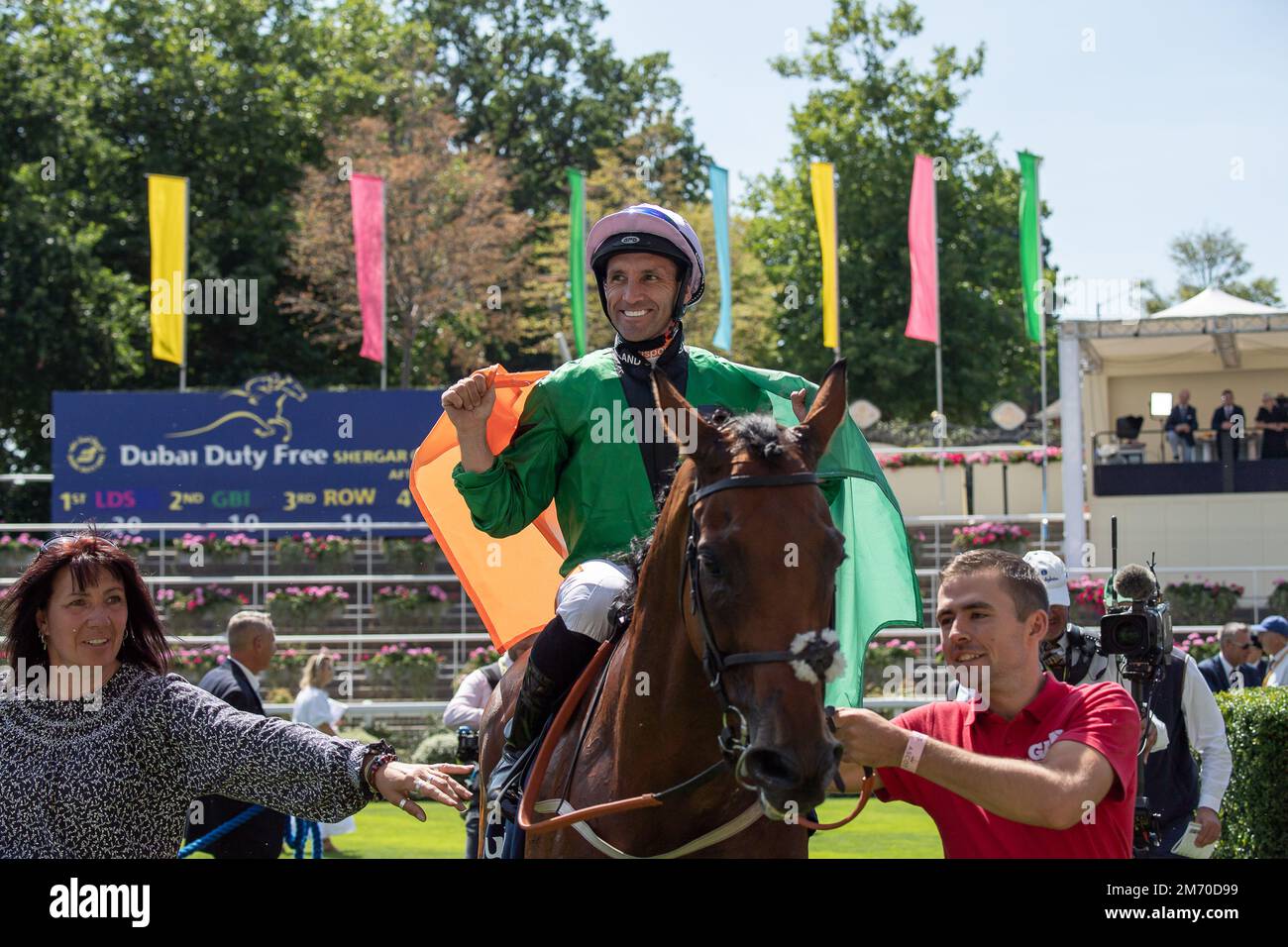 Ascot, Berkshire, UK. 6th August, 2022. Horse Orbaan ridden by jockey Neil Callan (green silks and pink cap) wins the Dubai Duty Free Full of Surprise Classified Stakes at the Dubai Duty Free Shergar Cup. Trainer David O'Meara, Upper Helmsley. Credit: Maureen McLean/Alamy Stock Photo