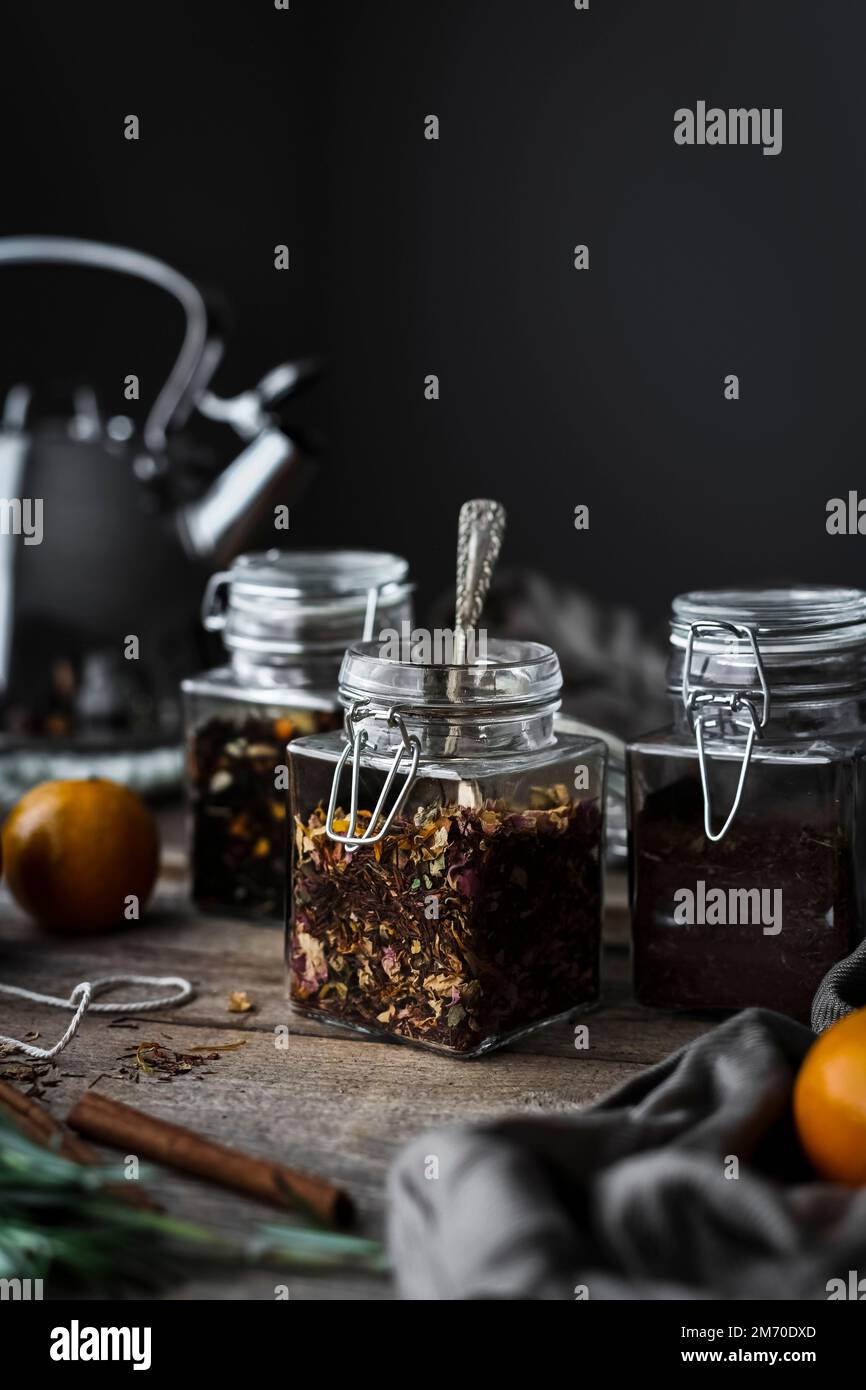 A group of rustic loose leaf teas with winter ingredients. Stock Photo