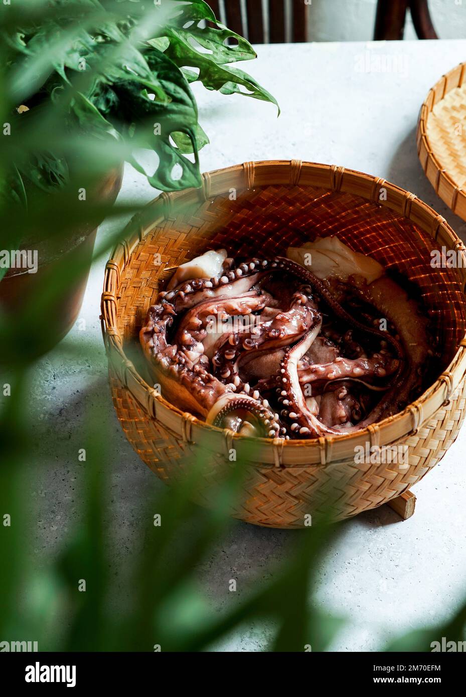 steamed octopus in a bamboo steamer, Asian style Stock Photo