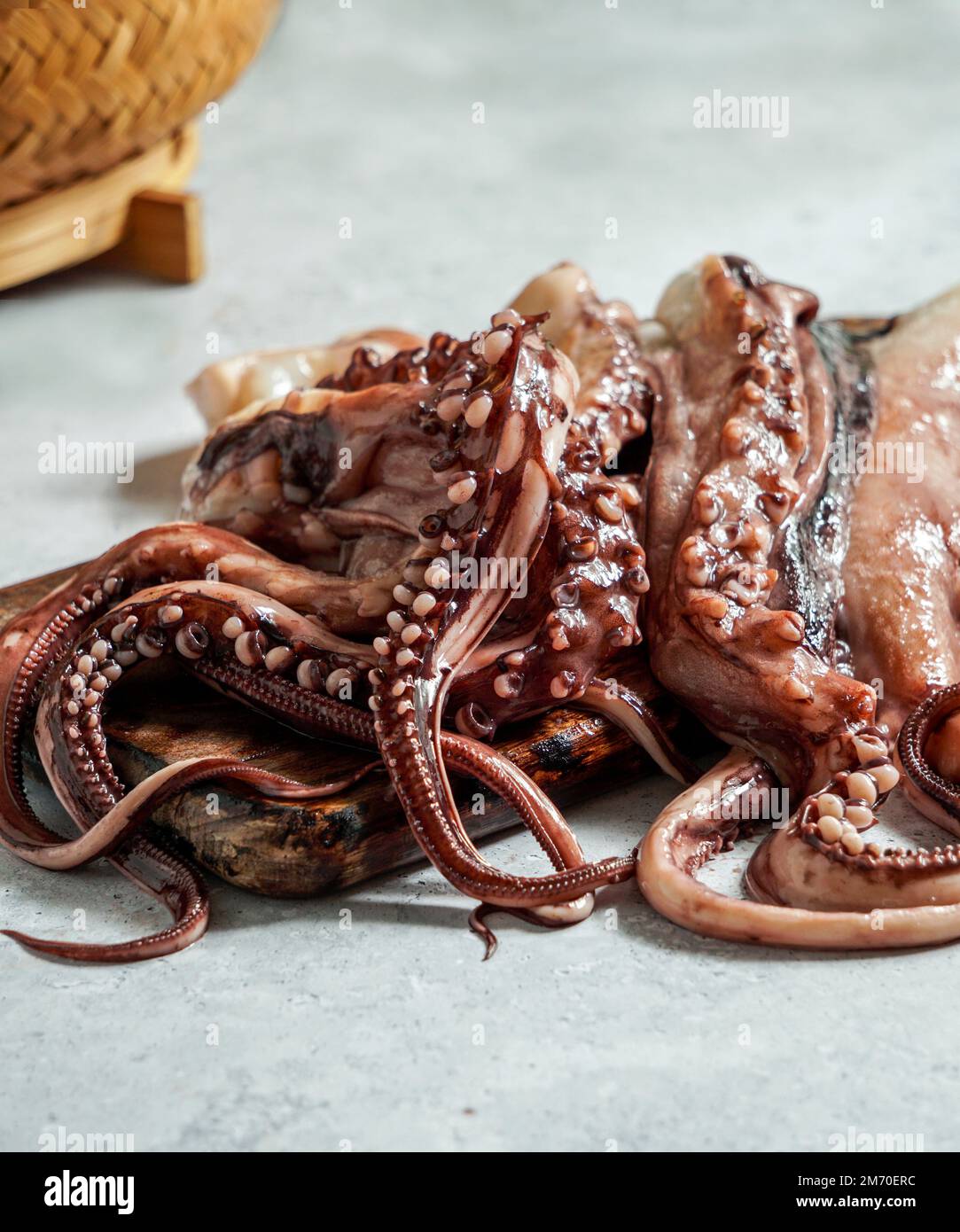 Raw Octopus Tentacles in a kitchen Stock Photo Alamy