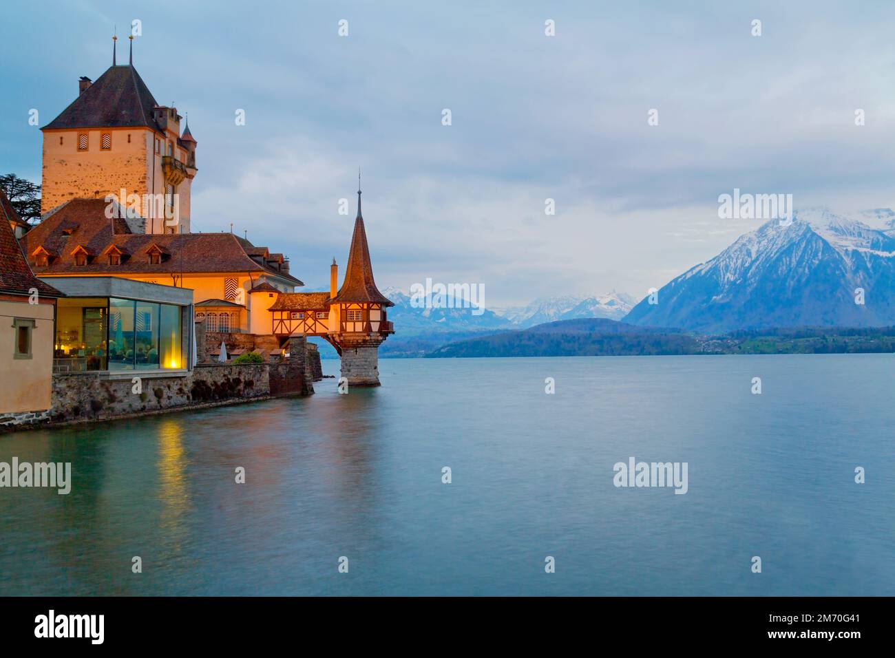 Oberhofen Castle at Lake Thunersee in swiss Alps, Switzerland Stock Photo