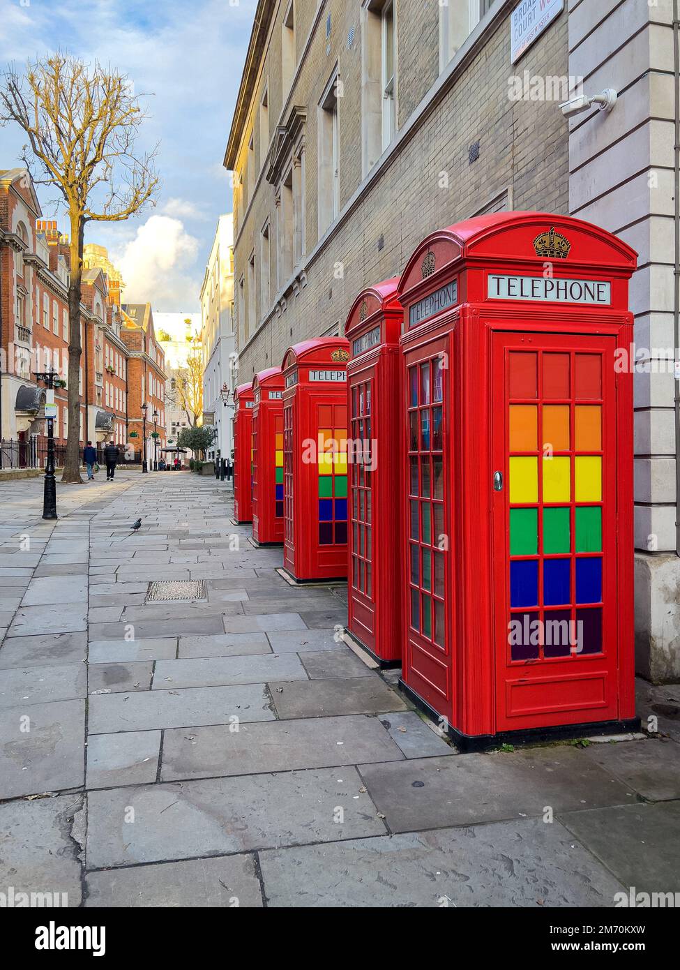 Red Telephone Booths with LGBTQ rainbow colors in London LONDON, UK