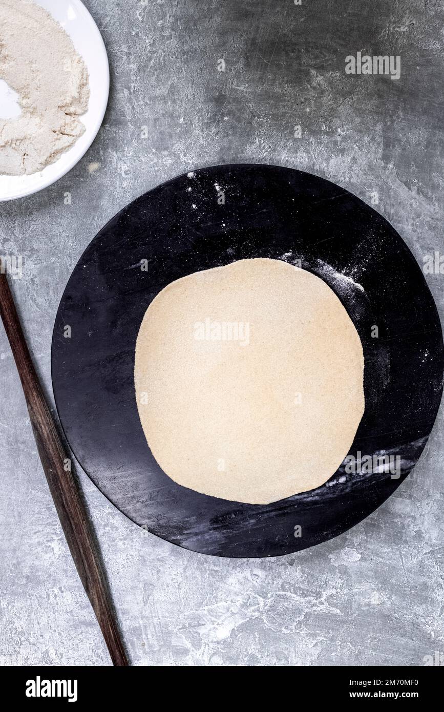 Steps to make chapati dough Stock Photo Alamy