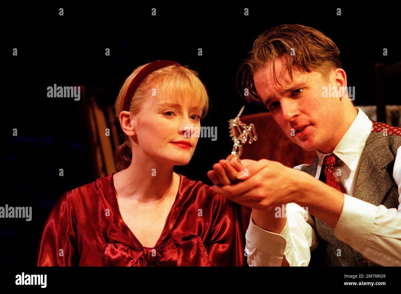Claire Skinner (Laura Wingfield), Mark Dexter (The Gentleman Caller) in THE GLASS MENAGERIE by Tennessee Williams at the Comedy Theatre, London SW1  11/12/1995 a Donmar Warehouse production  design: Rob Howell  lighting: David Hersey  director: Sam Mendes Stock Photo