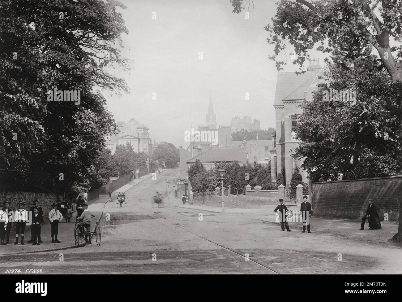 Vintage late 19th/early 20th century photograph: 1892 - Tricycle on Warwick Street, Leamington Spa, Warwickshire Stock Photo