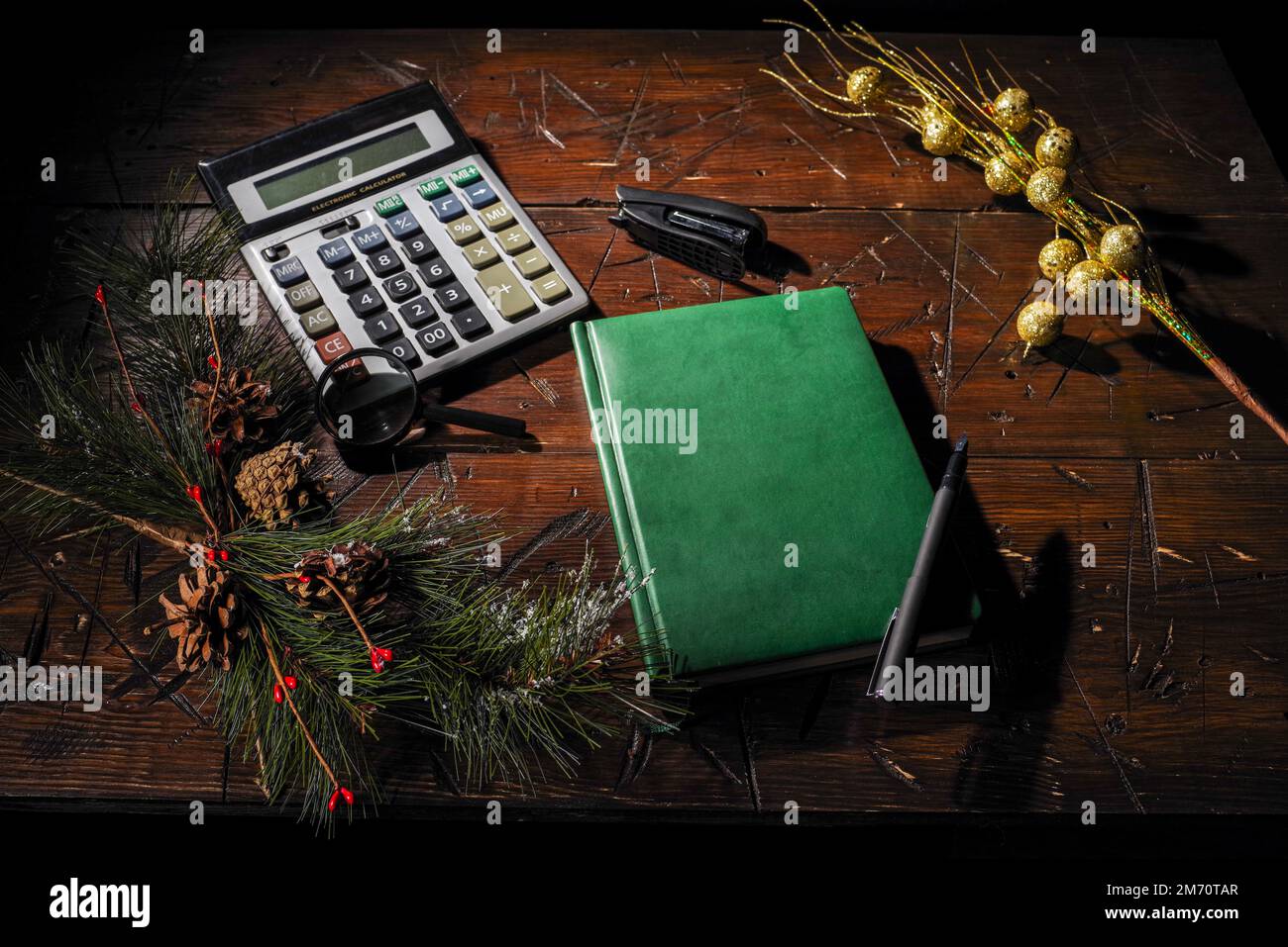 Take notes and count in a notebook. Diary and pen on the table