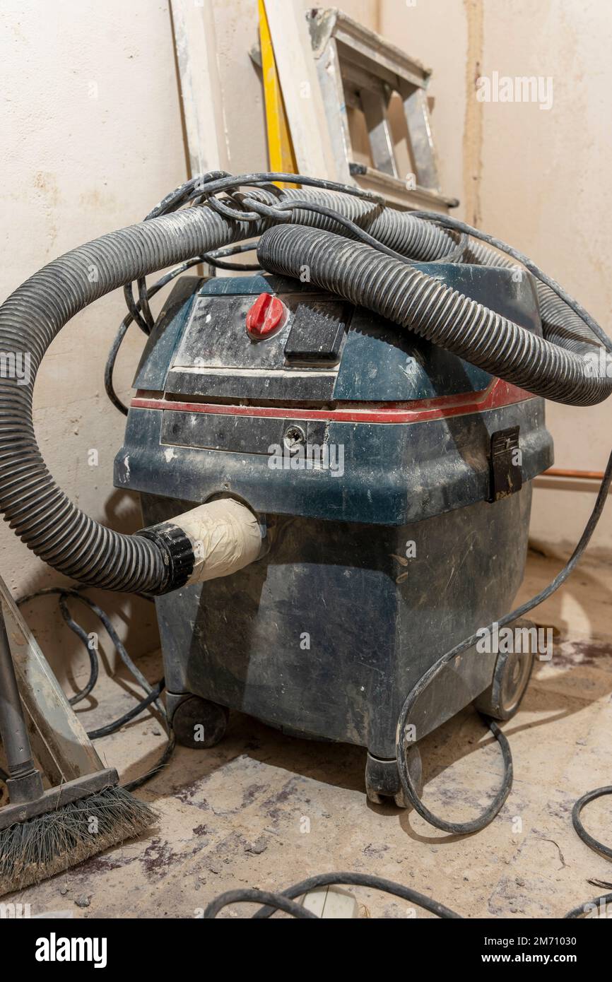 professional construction vacuum cleaner used during the renovation