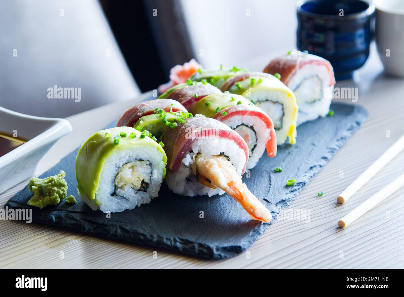 Premium Photo  Tasty sushi rolls guncan with a salmon