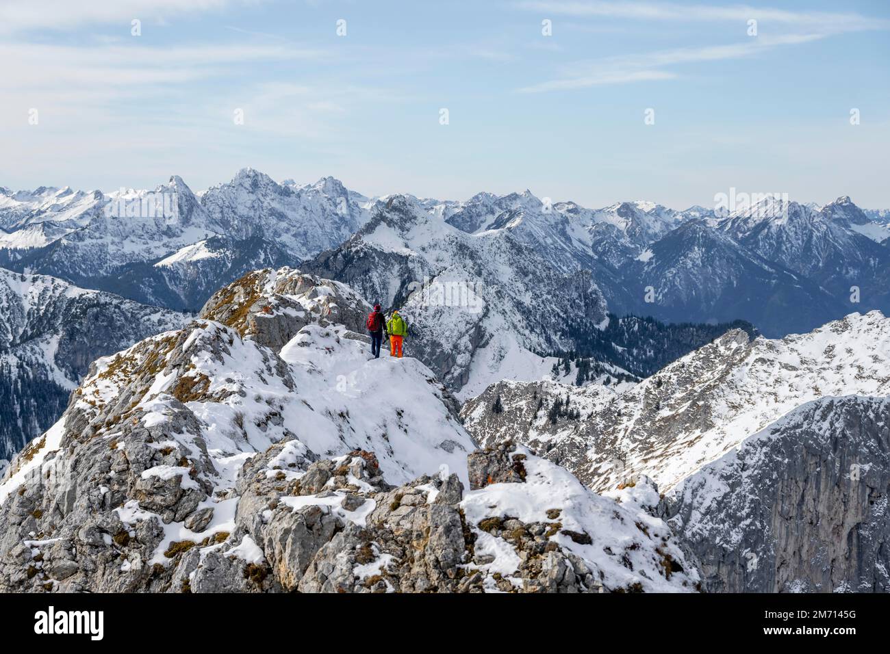 Climbers on the summit ridge, hiking to the Ammergauer Hochplatte in the Ammergau Alps in winter, snow-covered mountains, Bavaria, Germany Stock Photo
