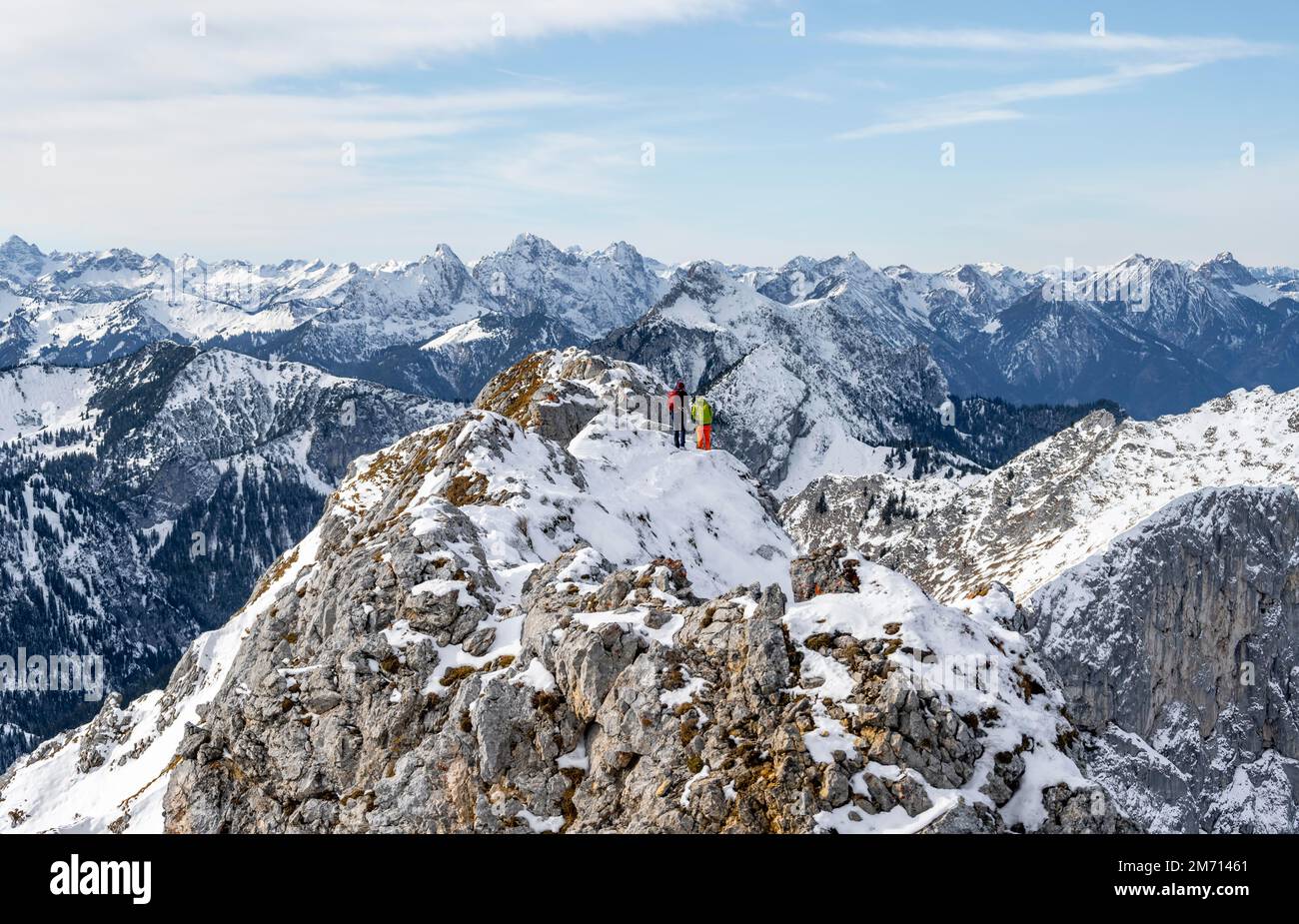 Climbers on the summit ridge, hiking to the Ammergauer Hochplatte in the Ammergau Alps in winter, snow-covered mountains, Bavaria, Germany Stock Photo