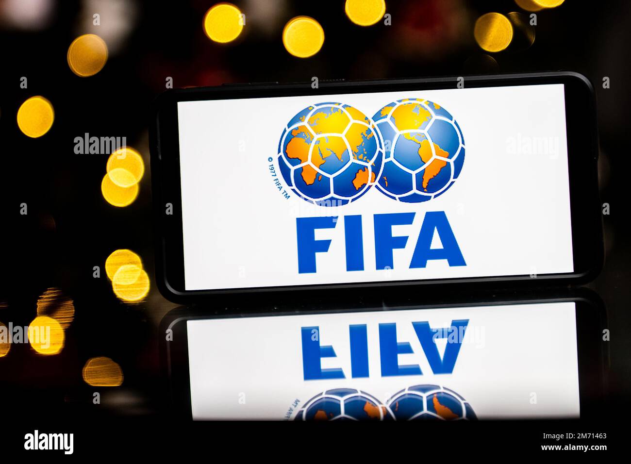 Poland. 6th Jan, 2023. In this photo illustration a FIFA logo seen ...