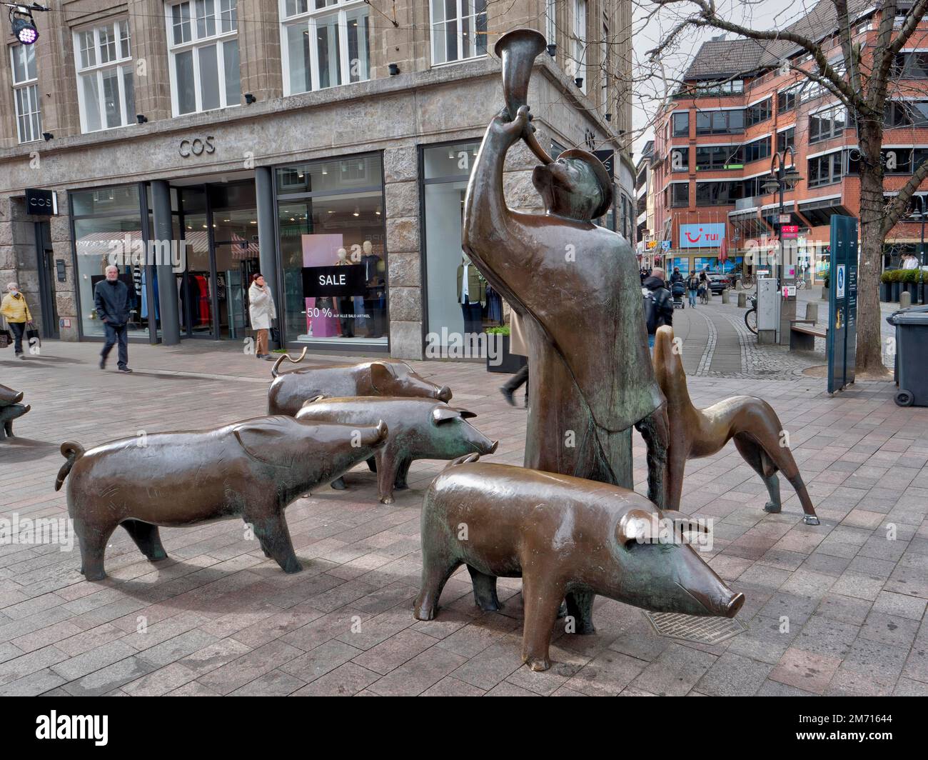 Group of bronze figures of a pig herder and his herd in Bremen-Mitte in Soegestrasse, Free Hanseatic City of Bremen, Bremen, Germany Stock Photo
