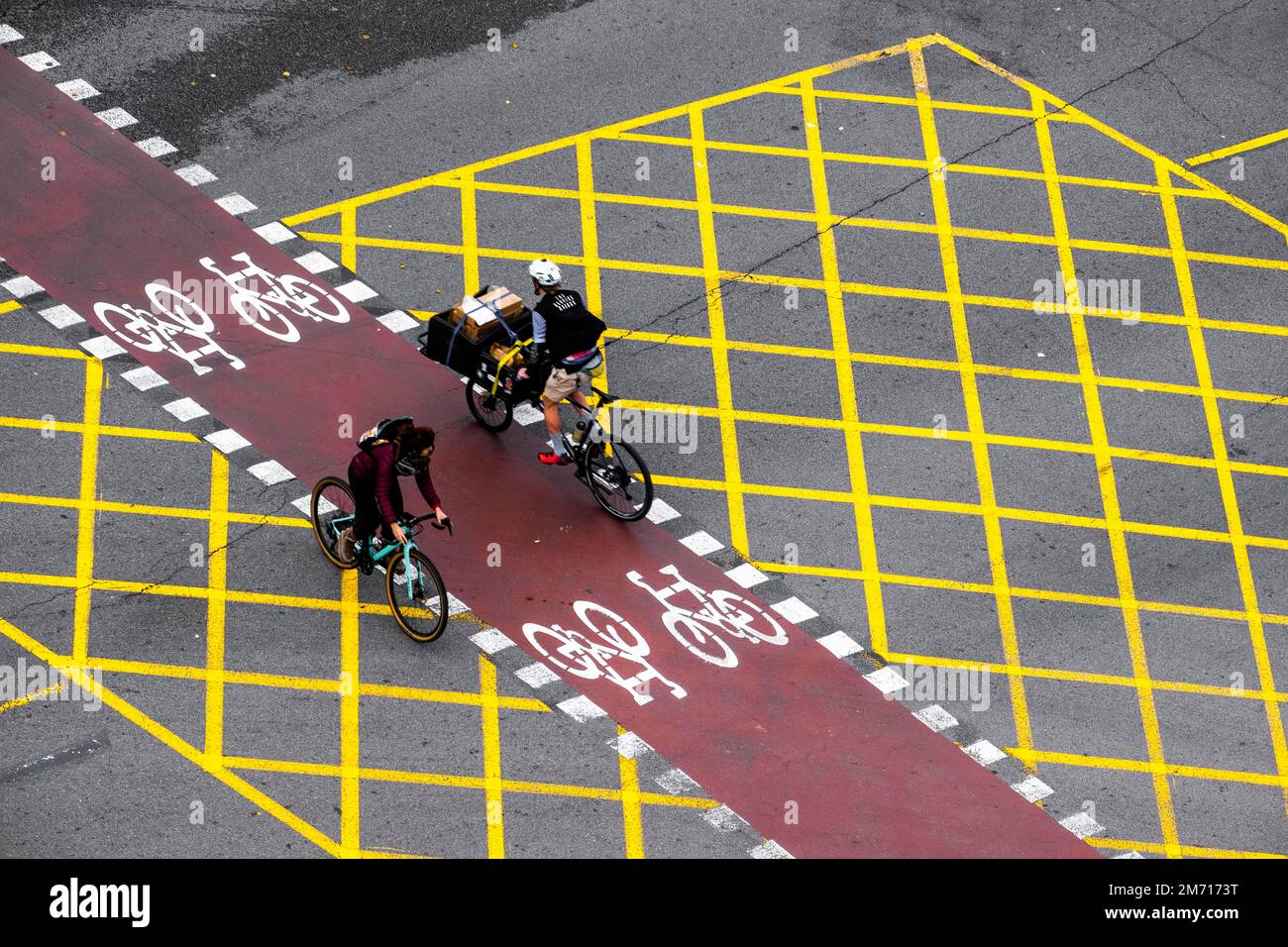 View from above of a street with an exclusive lane for bicycles in the city of Barcelona Stock Photo