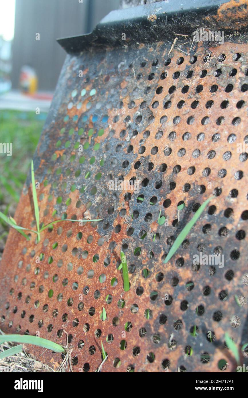 Rusted grill grate with holes texture close up Stock Photo Alamy