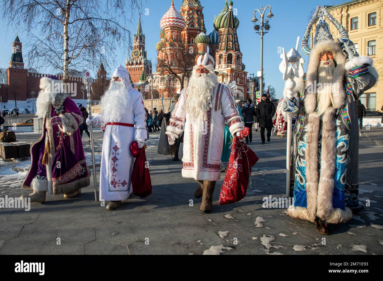 Moscow, Russia. 6th of January, 2023. Performers in Father Frost costumes  are seen in the downtown of Moscow city, Russia. On 5-7 January, Moscow is  hosting an event titled The Keepers of