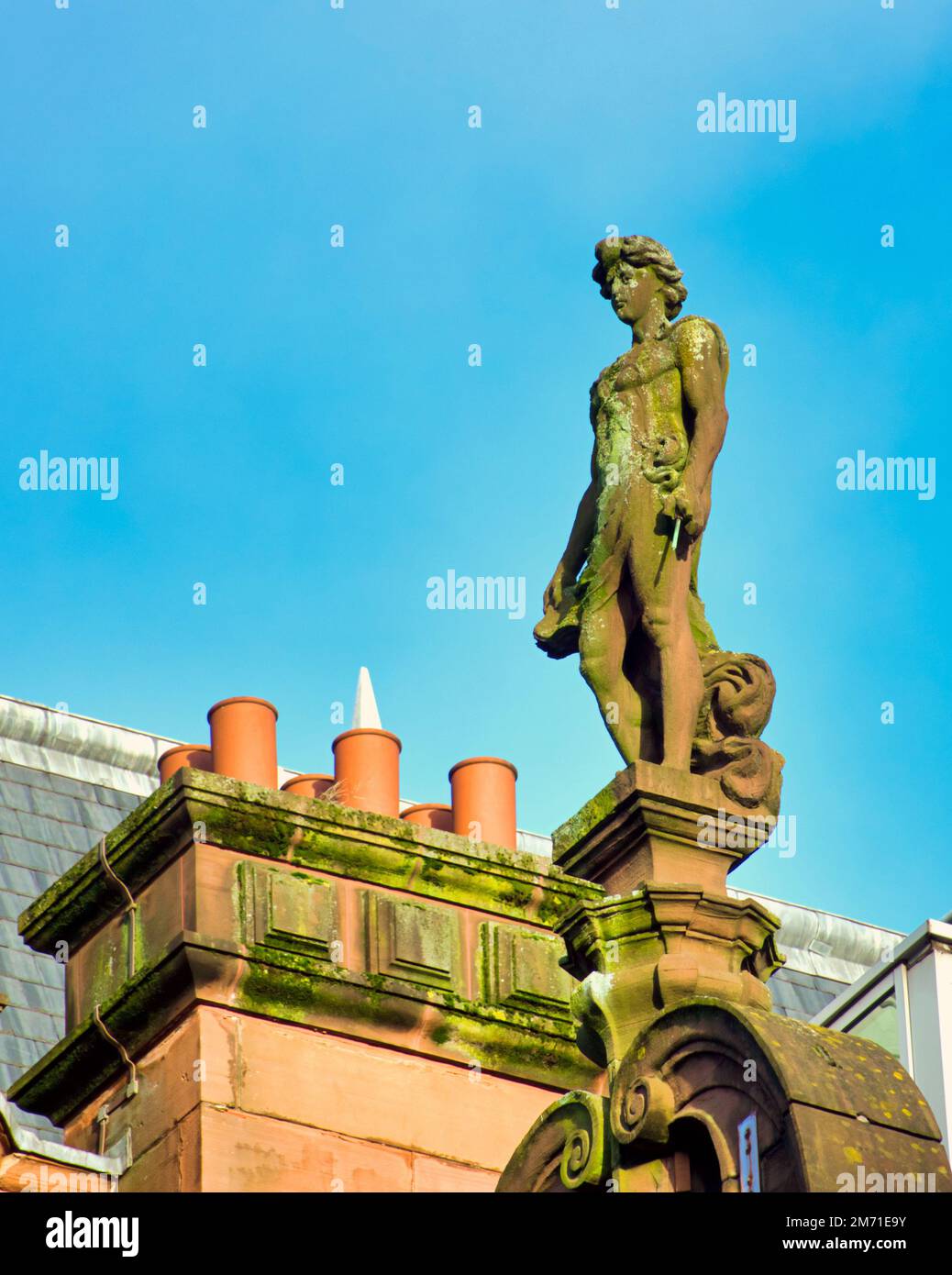 statue on Red sandstone building on Hope Street, Glasgow, Scotland, UK Stock Photo