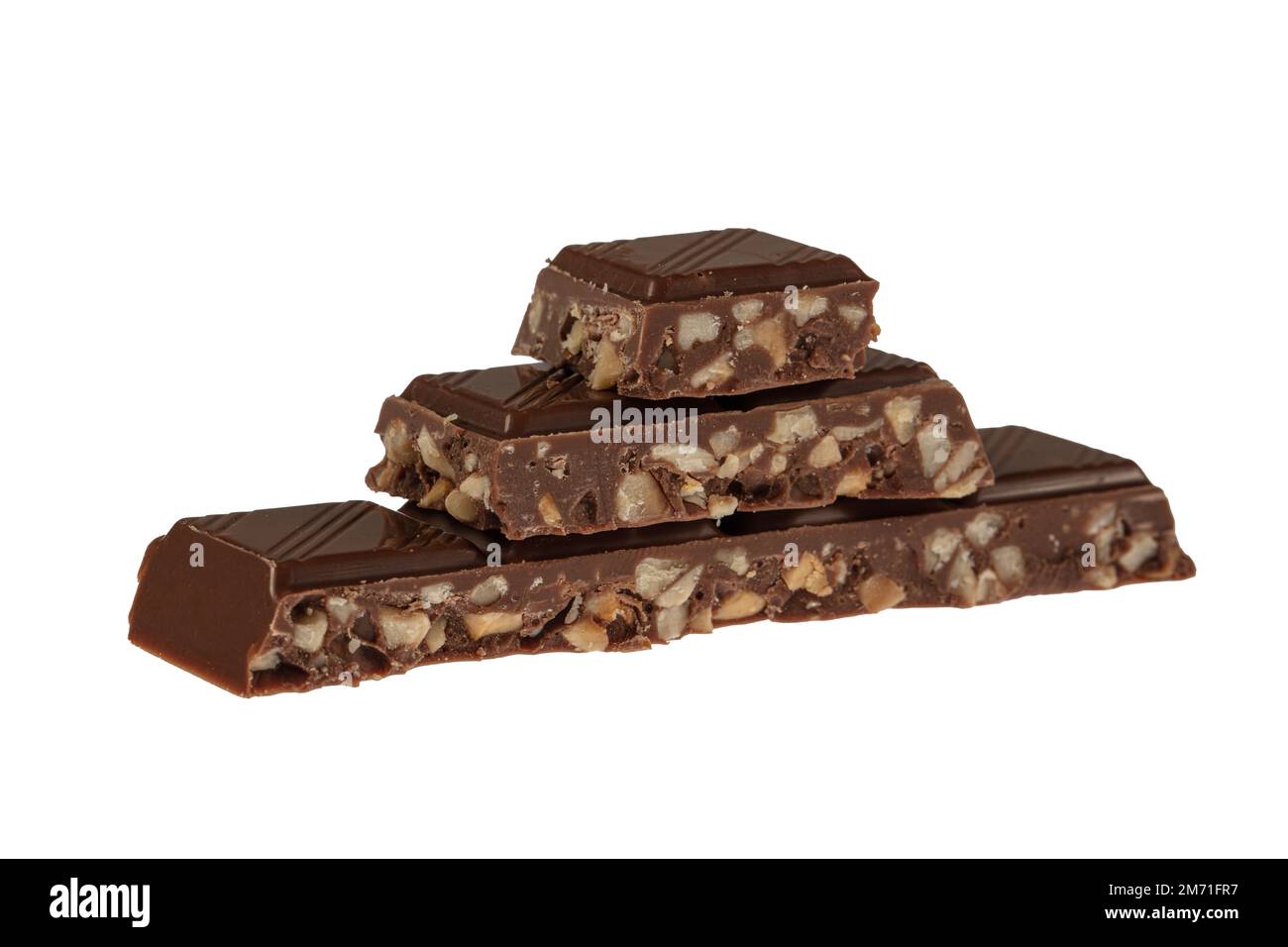 Hazelnut chocolate. Hazelnut chocolate bar pieces tower. Bars of milk