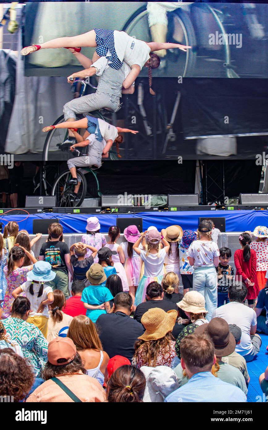 The Gagaliardies performing for a young crowd, on stage at Elevate Sydney in January 2023 on the Cahill Expressway in New South Wales, Australia Stock Photo